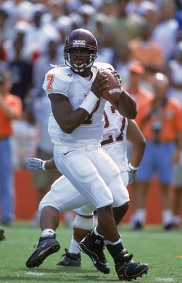 4 Nov 2000: Michael Vick #7 of the Virginia Tech Hokies drops back to pass the ball during the game against the Miami Hurricanes at the Orange Bowl in Miami, Florida. The Hurricanes defeated the Hokies 41-21.Mandatory Credit: Scott Halleran  /Allsport