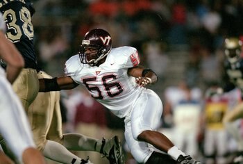 30 Oct 1999: Corey Moore #56 of the Virginia Tech Hokies moves on the field during the game against the Pittsburgh Panthers at the Pittsburgh Stadium in Pittsburgh, Pennsylvania. The Panthers defeated the Hokies 30-17. Mandatory Credit: Doug Pensinger  /A