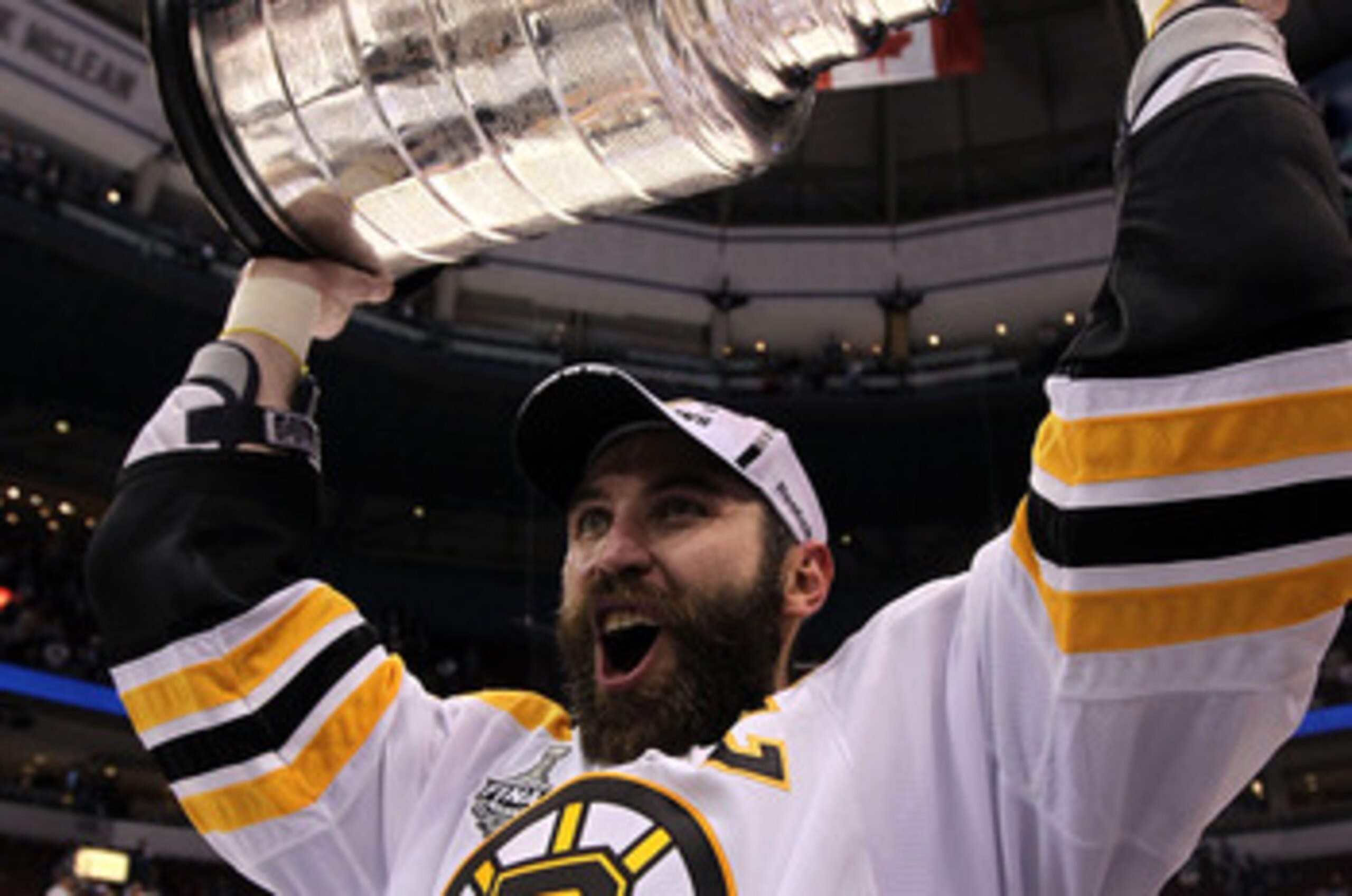 VANCOUVER, BC - JUNE 15:  Zdeno Chara #33 of the Boston Bruins celebrates with the Stanley Cup after defeating the Vancouver Canucks in Game Seven of the 2011 NHL Stanley Cup Final at Rogers Arena on June 15, 2011 in Vancouver, British Columbia, Canada. T