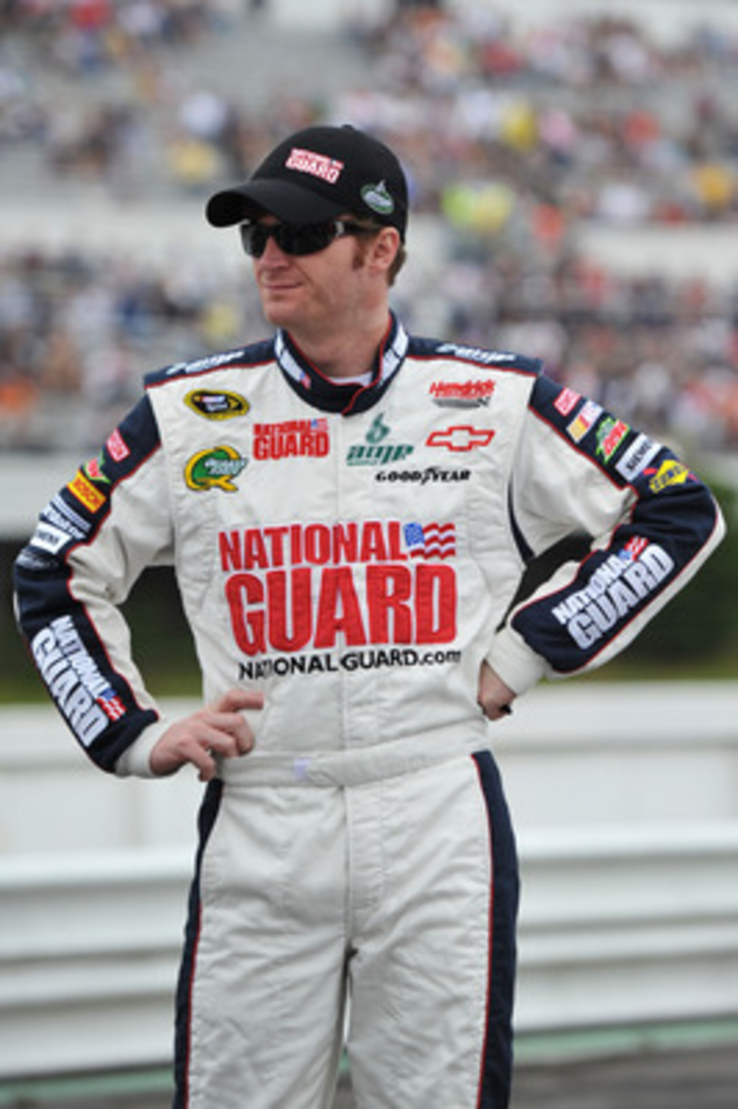 LONG POND, PA - JUNE 12:  Dale Earnhardt Jr., driver of the #88 National Guard/Amp Energy Chevrolet, stands on the grid during pre-race ceremonies for the NASCAR Sprint Cup Series 5-Hour Energy 500 at Pocono Raceway on June 12, 2011 in Long Pond, Pennsylv