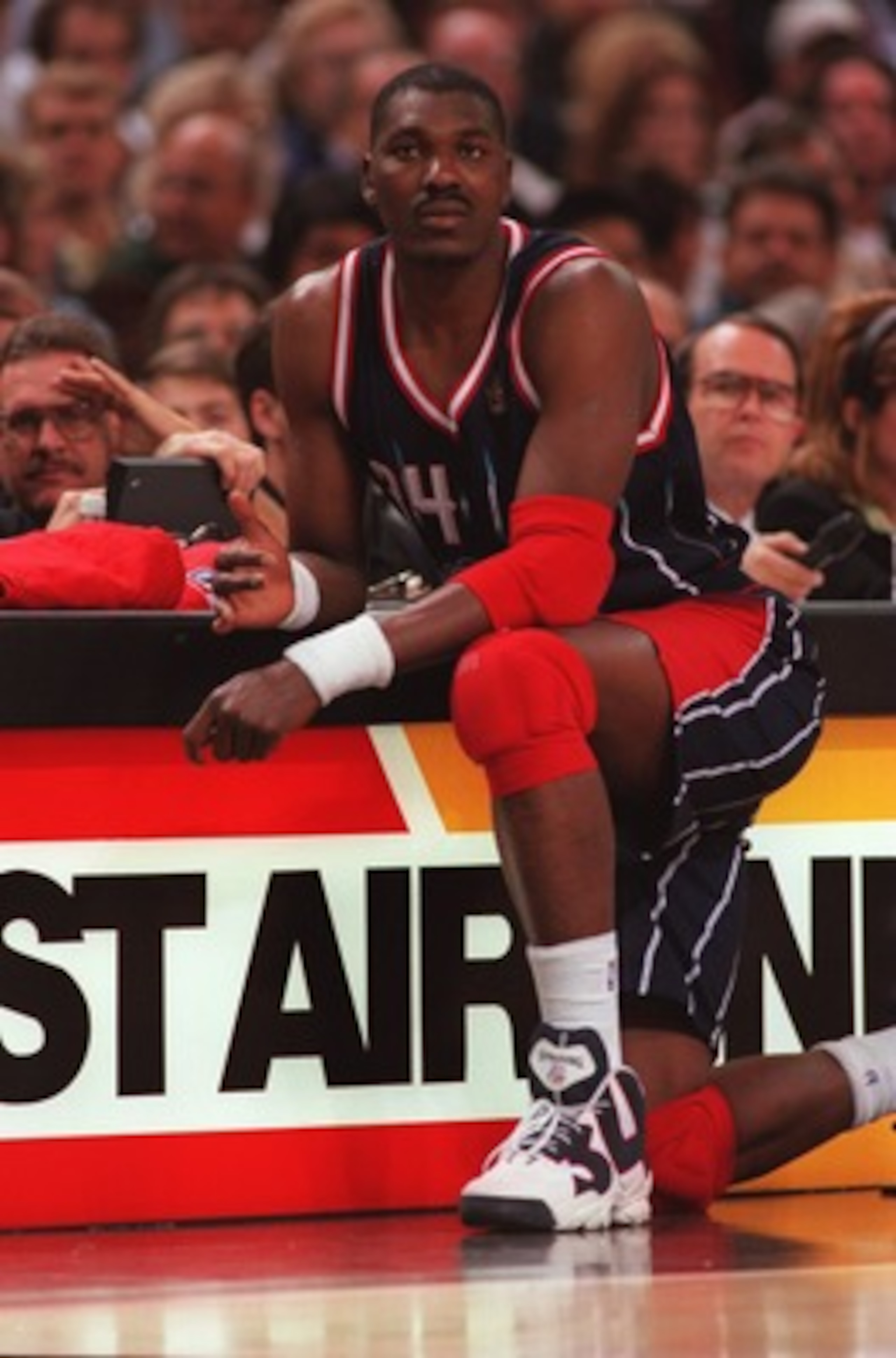 5 Nov 1996: Center Hakeem Olajuwon of the Houston Rockets waits to enter the game during the Rockets 102-80 win over the Sacramento Kings at Arco Arena in Sacramento, California. Mandatory Credit: Otto Gruele/Allsport 5 Nov 1996: Center Hakeem Olajuwon of the Houston Rockets waits to enter the game during the Rockets 102-80 win over the Sacramento Kings at Arco Arena in Sacramento, California. Mandatory Credit: Otto Gruele/Allsport