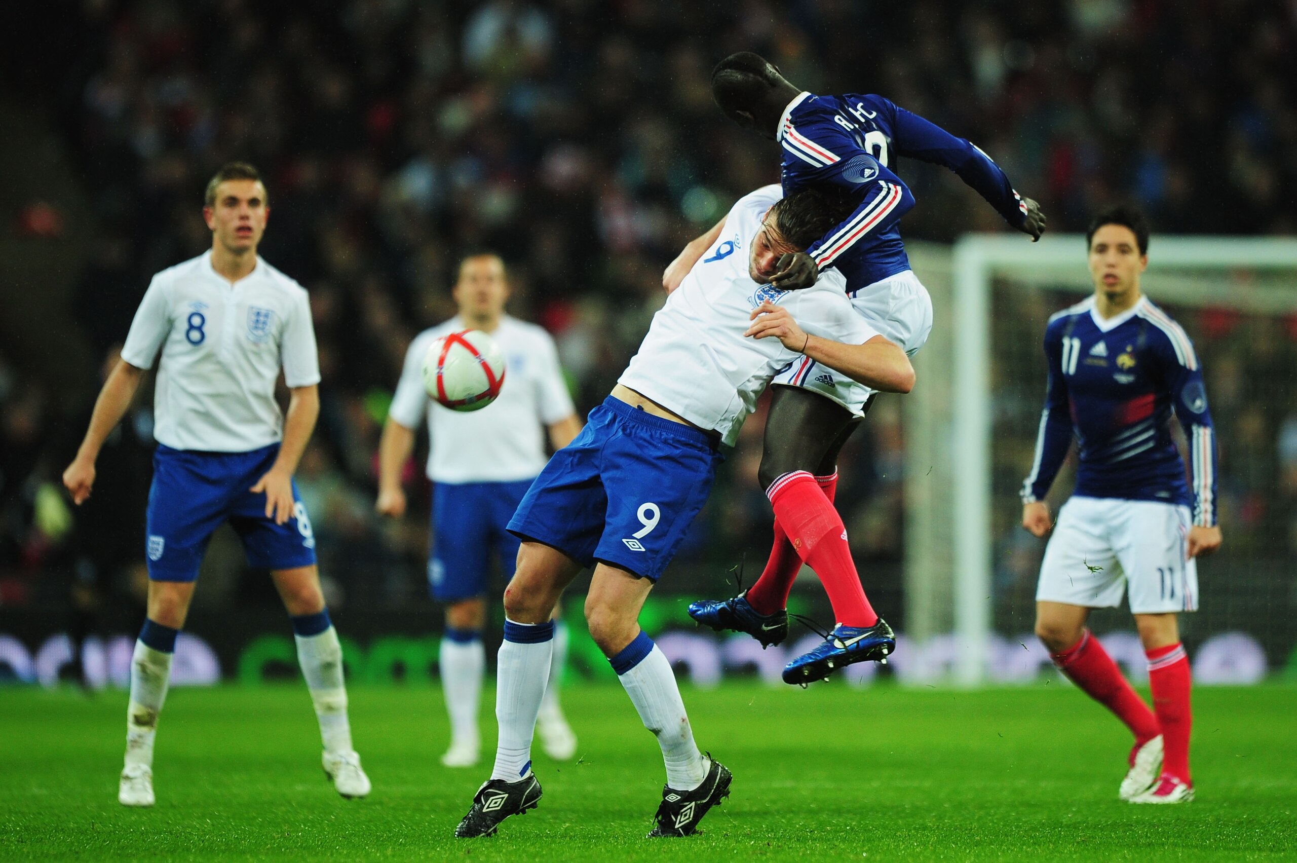 LONDON, ENGLAND - NOVEMBER 17:  Mamadou Sakho of France battles with Andy Carroll of England during the international friendly match between England and France at Wembley Stadium on November 17, 2010 in London, England.  (Photo by Shaun Botterill/Getty Im