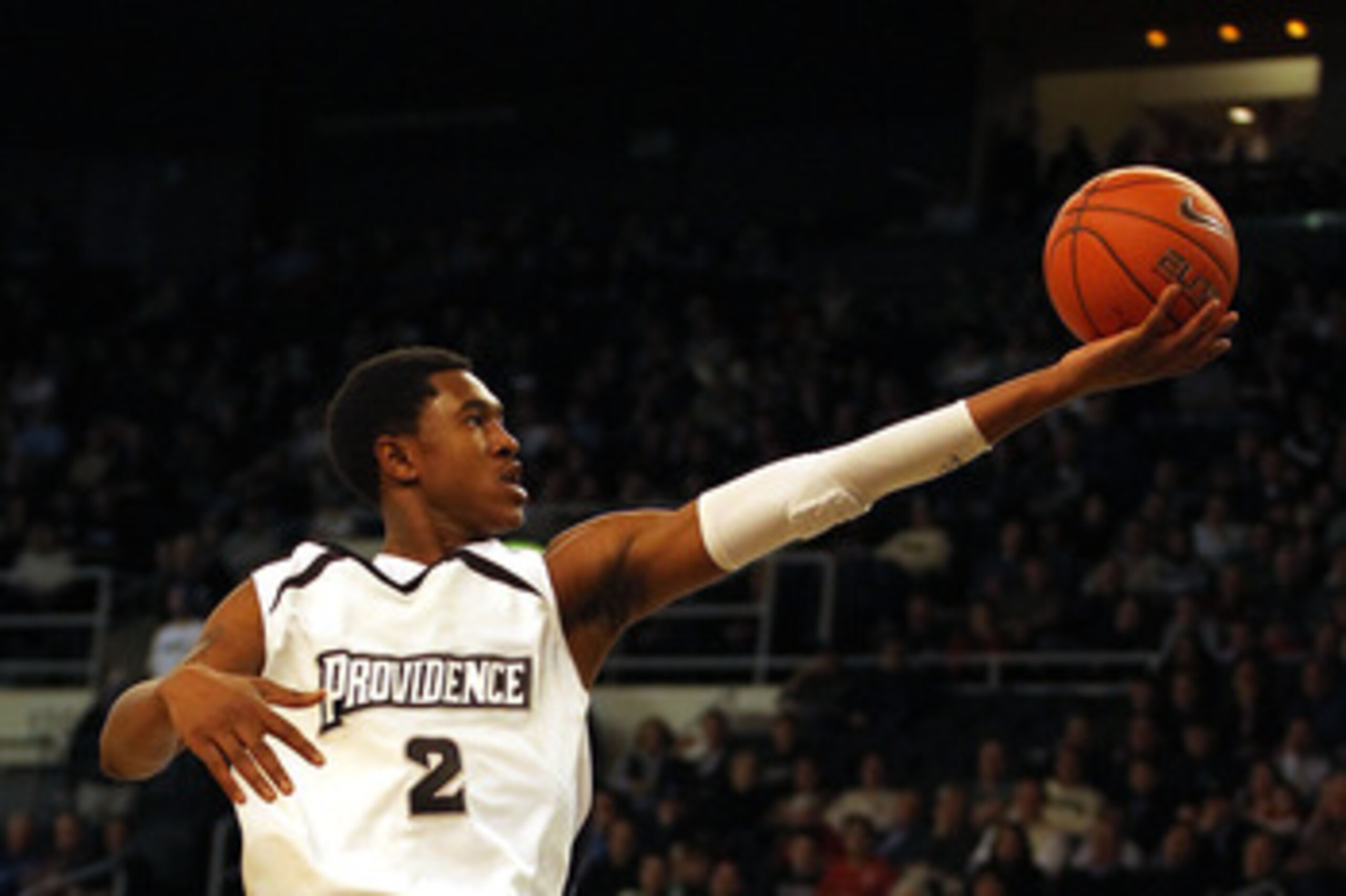 PROVIDENCE, RI - DECEMBER 04:  Marshon Brooks #2 of the Providence Friars drives for a shot attempt against the Rhode Island Rams at the Dunkin' Donuts Center on December 4, 2010 in Providence, Rhode Island. (Photo by Chris Chambers/Getty Images)