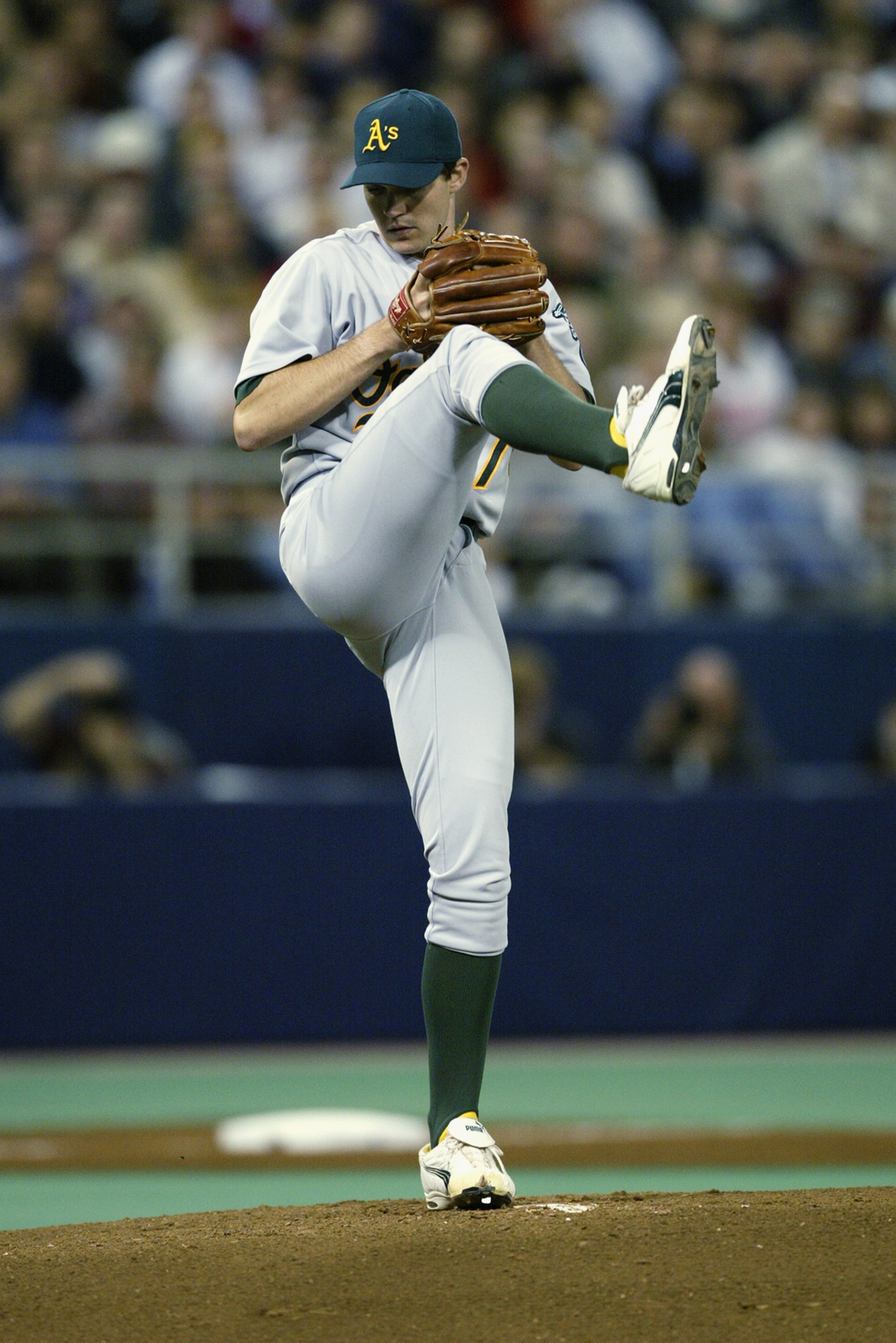 MINNEAPOLIS - OCTOBER 4:  Starting pitcher Barry Zito #75 of the Oakland A's throws against the Minnesota Twins during the American League Division Series October 4, 2002 at the Hubert H Humphrey Dome in Minneapolis, Minnesota.  The A's won 6-3.  (Photo b