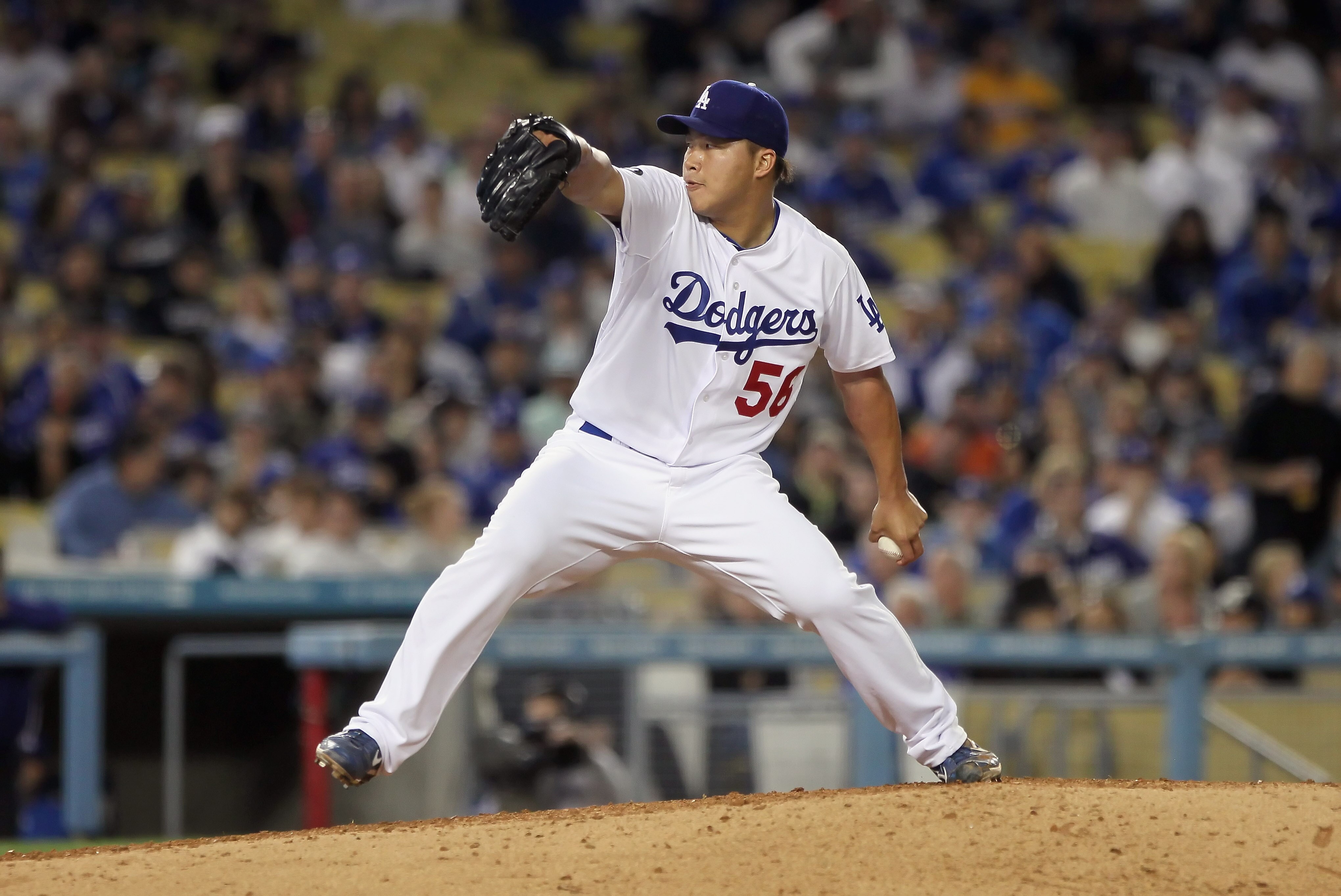 LOS ANGELES, CA - APRIL 03:  Hong-Chih Kuo #56 of the Los Angeles Dodgers pitches against the San Francisco Giants at Dodger Stadium on April 3, 2011 in Los Angeles, California.  (Photo by Jeff Gross/Getty Images)