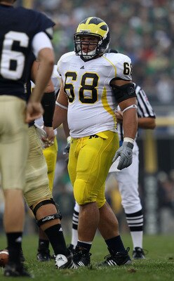 SOUTH BEND, IN - SEPTEMBER 11: Mike Martin #68 of the Michigan Wolverines awaits the start of play against the Notre Dame Fighting Irish at Notre Dame Stadium on September 11, 2010 in South Bend, Indiana. Michigan defeated Notre Dame 28-24.  (Photo by Jon