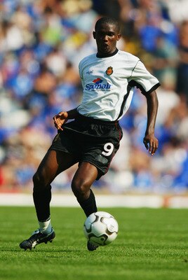 BIRMINGHAM - AUGUST 9:  Samuel Eto'o of Real Mallorca brings the ball forward during the Pre-Season Friendly match between Birmingham City and Real Mallorca held on August 9, 2003 at St Andrews, in Birmingham, England. The match ended in a 0-0 draw. (Phot