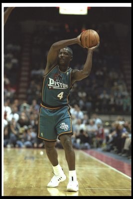 12 Nov 1996: Guard Joe Dumars of the Detroit Pistons looks to pass the ball during a game against the Washington Bullets at the USAir Arena in Landover, Maryland. The Pistons won the game, 92-79.