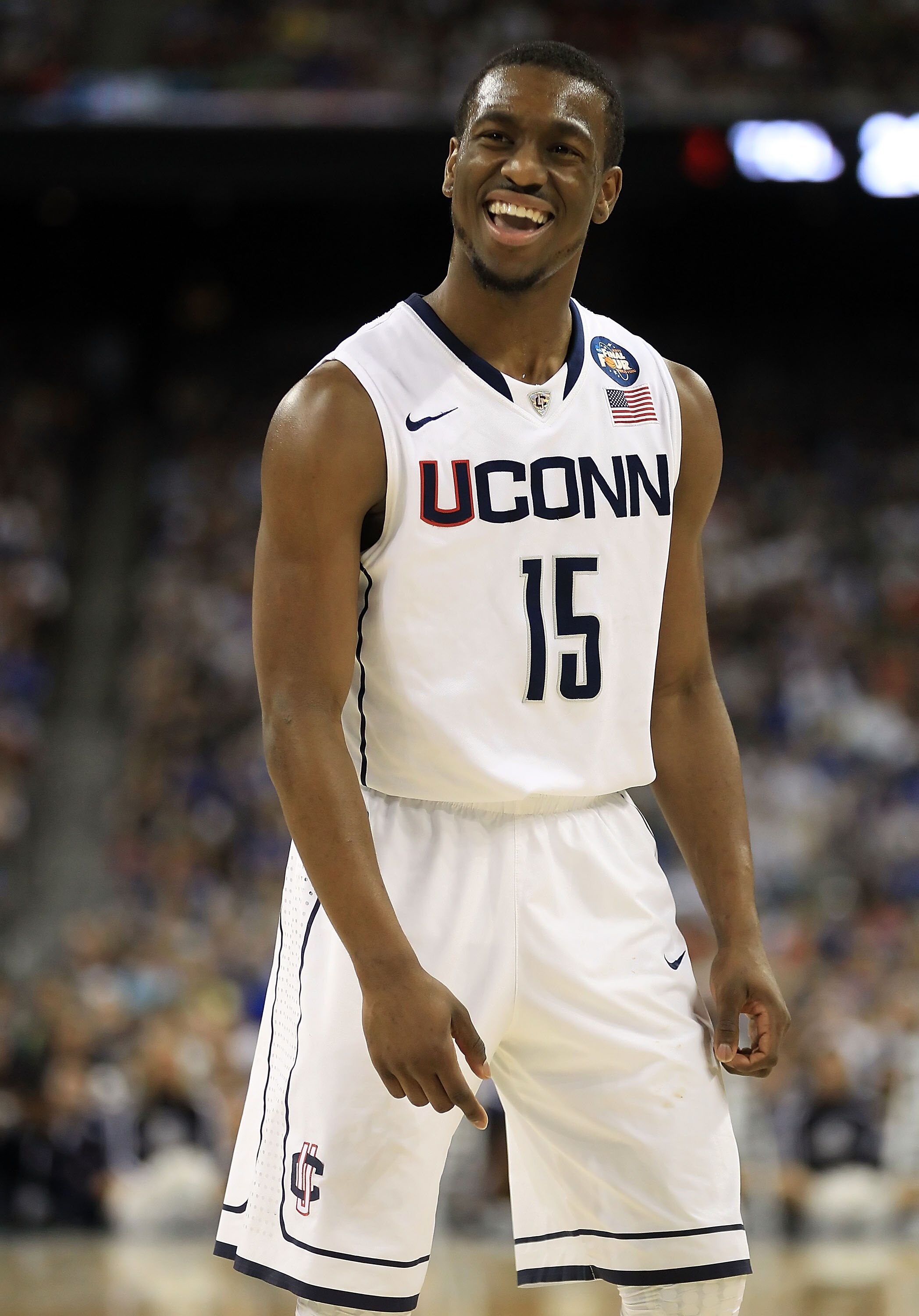 HOUSTON, TX - APRIL 04:  Kemba Walker #15 of the Connecticut Huskies reacts after a play against the Butler Bulldogs during the National Championship Game of the 2011 NCAA Division I Men's Basketball Tournament at Reliant Stadium on April 4, 2011 in Houst