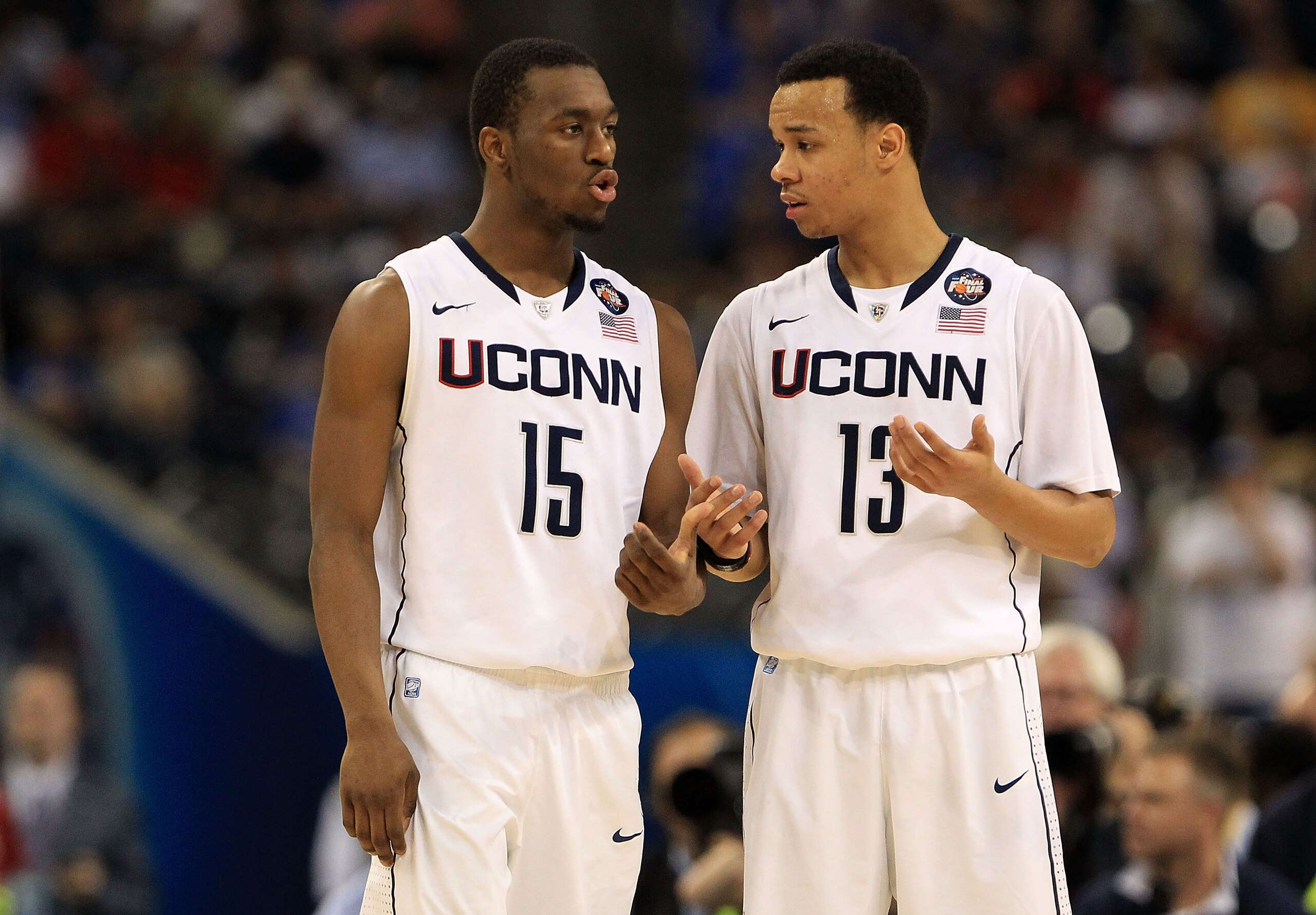 HOUSTON, TX - APRIL 02:  Kemba Walker #15 and Shabazz Napier #13 of the Connecticut Huskies talk on the court against the Kentucky Wildcats during the National Semifinal game of the 2011 NCAA Division I Men's Basketball Championship at Reliant Stadium on