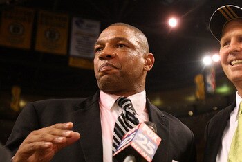 BOSTON - JUNE 17:  Head coach Doc Rivers and Executive Director of Basketball Operations Danny Ainge of the Boston Celtics celebrate after defeating the Los Angeles Lakers in Game Six of the 2008 NBA Finals on June 17, 2008 at TD Banknorth Garden in Bosto