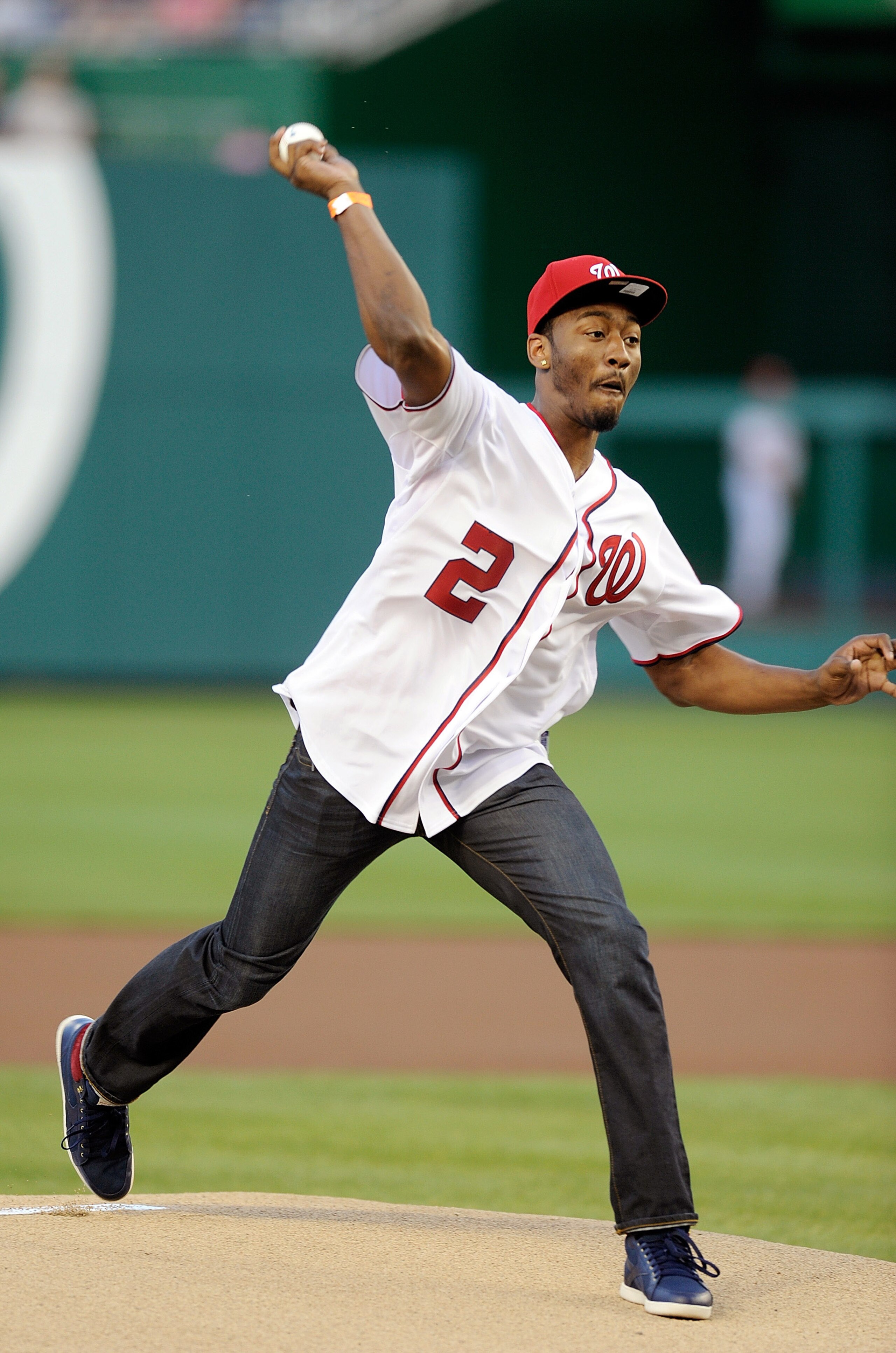 WASHINGTON, DC - JUNE 17:  Joh Wall of the Washington Wizards throws out the ceremonial first pitch before the game between the Baltimore Orioles and the Washington Nationals at Nationals Park on June 17, 2011 in Washington, DC.  (Photo by Greg Fiume/Gett