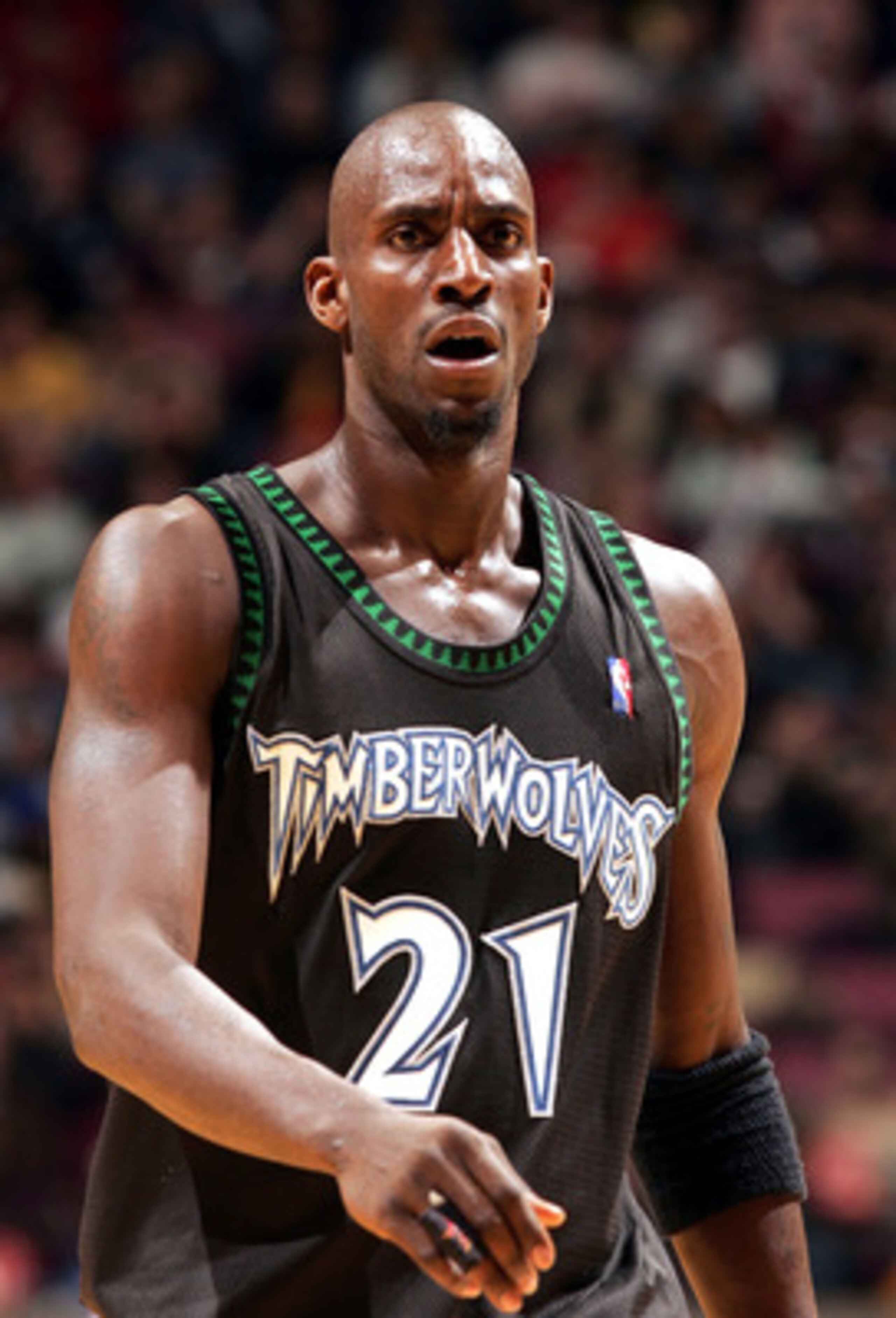 EAST RUTHERFORD , NJ - MARCH 26: Kevin Garnett #21 of the Minnesota Timberwolves looks on during their game against the New Jersey Nets on March 26, 2005 at Continental Airlines Arena in East Rutherford, New Jersey. NOTE TO USER: User expressly acknowl EAST RUTHERFORD , NJ - MARCH 26: Kevin Garnett #21 of the Minnesota Timberwolves looks on during their game against the New Jersey Nets on March 26, 2005 at Continental Airlines Arena in East Rutherford, New Jersey. NOTE TO USER: User expressly acknowl