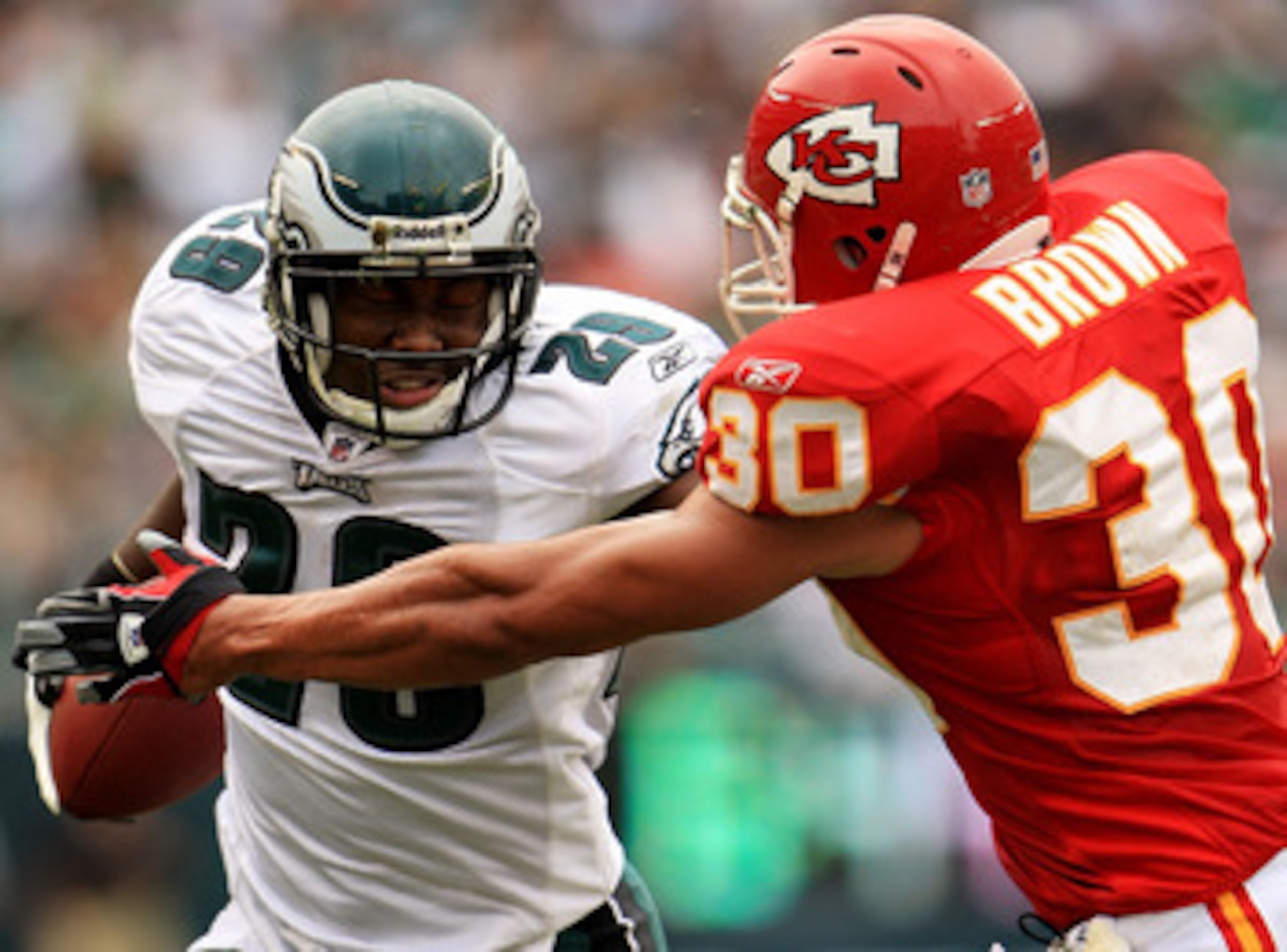 PHILADELPHIA - SEPTEMBER 27:  LeSean McCoy #29 of the Philadelphia Eagles tries to break free from Mike Brown #30 of the Kansas City Chiefs during their game on September 27, 2009 at Lincoln Financial Field in Philadelphia, Pennsylvania.  (Photo by Travis