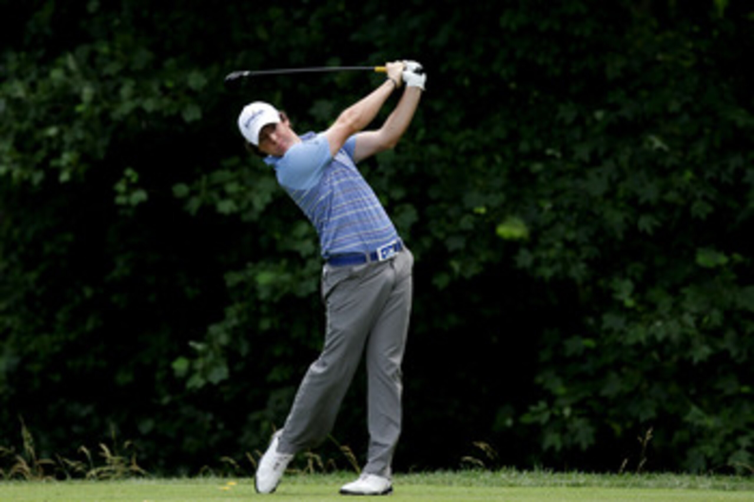 BETHESDA, MD - JUNE 17:  Rory McIlroy of Northern Ireland hits his tee shot on the 14th hole during the second round of the 111th U.S. Open at Congressional Country Club on June 17, 2011 in Bethesda, Maryland.  (Photo by David Cannon/Getty Images)