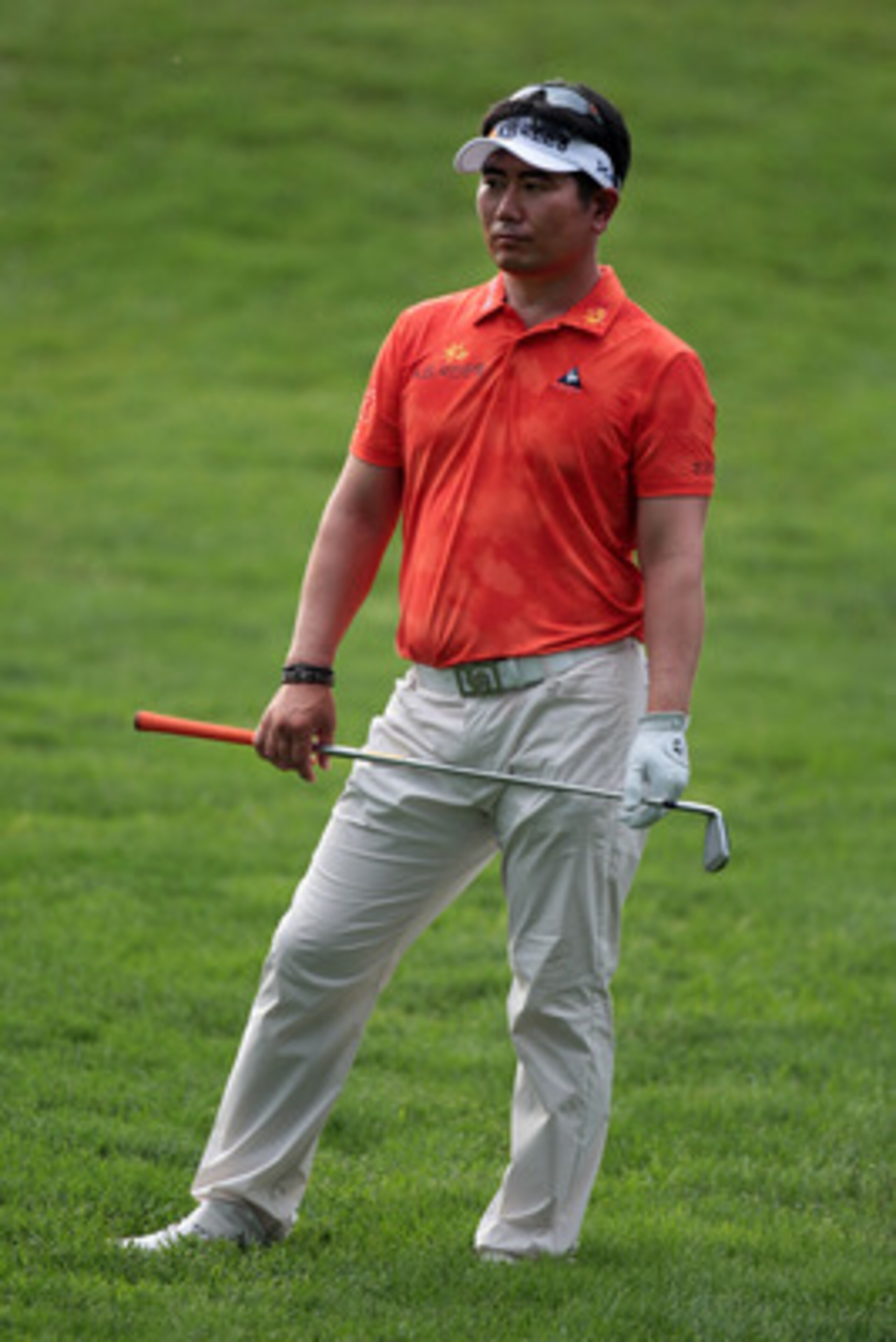 BETHESDA, MD - JUNE 17:  Y.E. Yang of South Korea looks on from the 16th fairway during the second round of the 111th U.S. Open at Congressional Country Club on June 17, 2011 in Bethesda, Maryland.  (Photo by Ross Kinnaird/Getty Images)