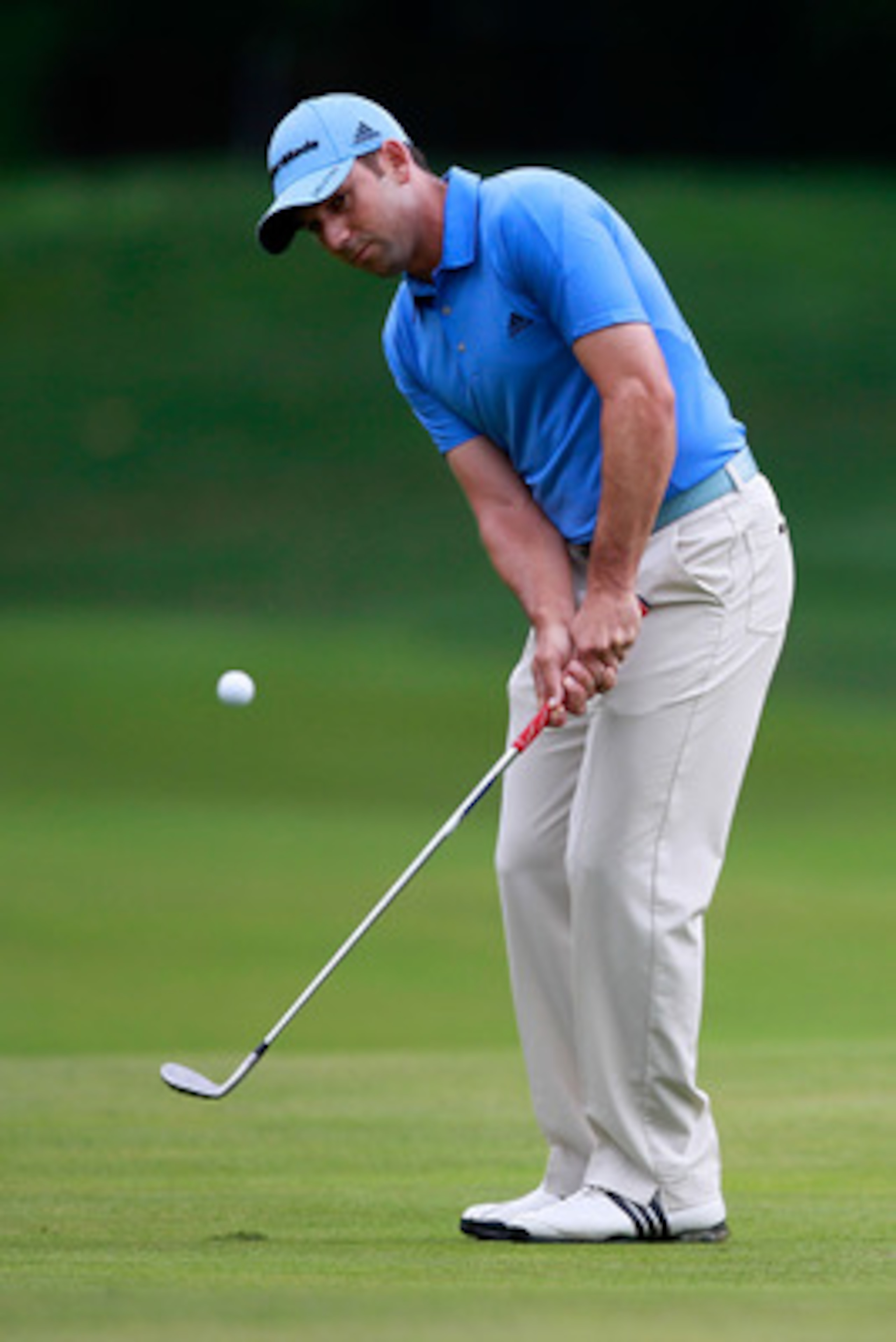 BETHESDA, MD - JUNE 17: Sergio Garcia of Spain chips on the 14th green during the second round of the 111th U.S. Open at Congressional Country Club on June 17, 2011 in Bethesda, Maryland.  (Photo by Chris Trotman/Getty Images)