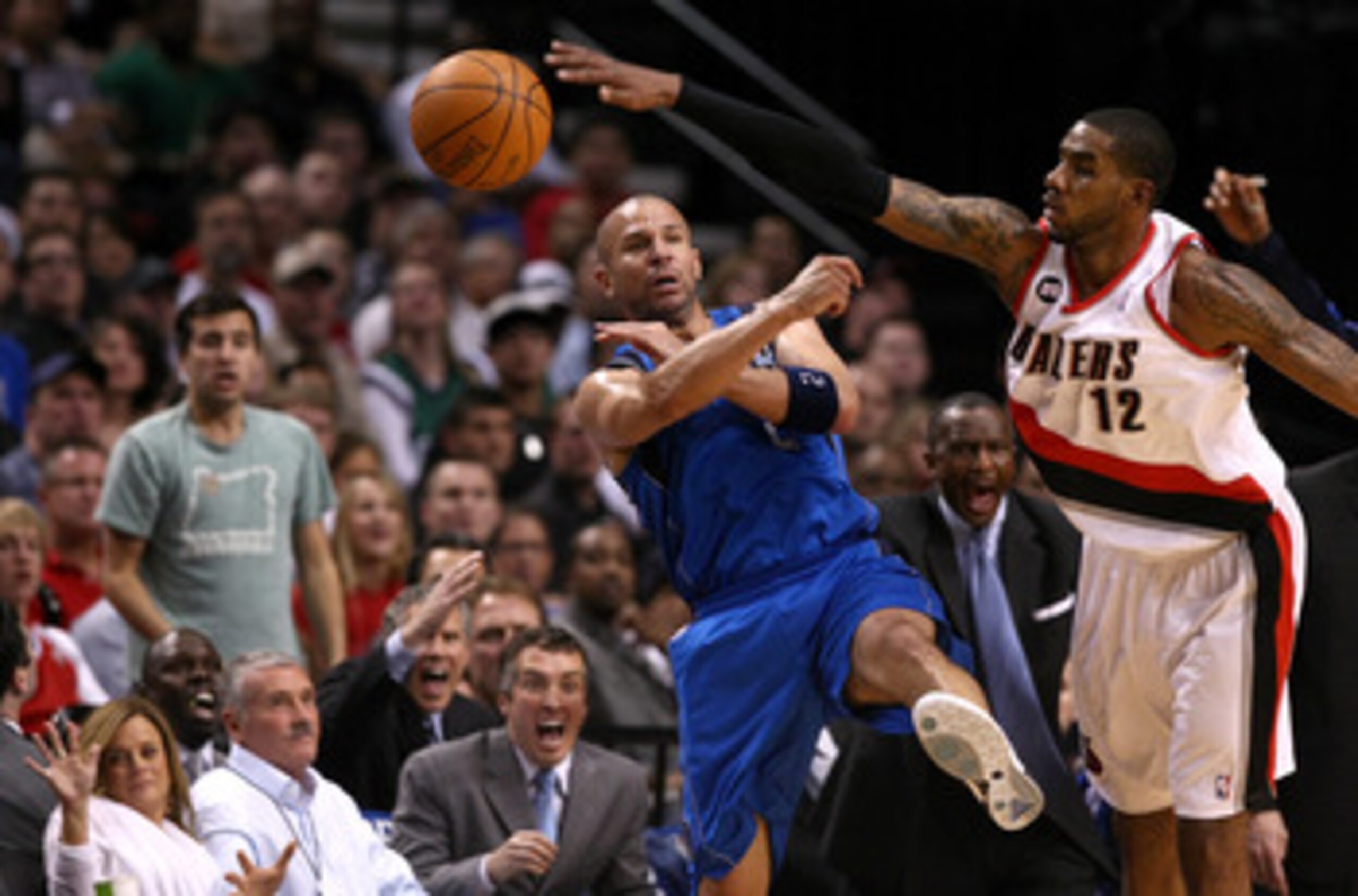 PORTLAND, OR - APRIL 23:  LaMarcus Aldridge #12 of the Portland Trail Blazers defends Jason Kidd #2 of the Dallas Mavericks in Game Four of the Western Conference Quarterfinals in the 2011 NBA Playoffs on April 23, 2011 at the Rose Garden in Portland, Ore