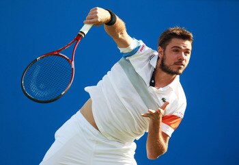 LONDON, ENGLAND - JUNE 07:  Stanislas Wawrinka of Switzerland serves during his Men's Singles first round match against James Ward of Great Britain on day two of the AEGON Championships at Queens Club on June 7, 2011 in London, England.  (Photo by Julian 