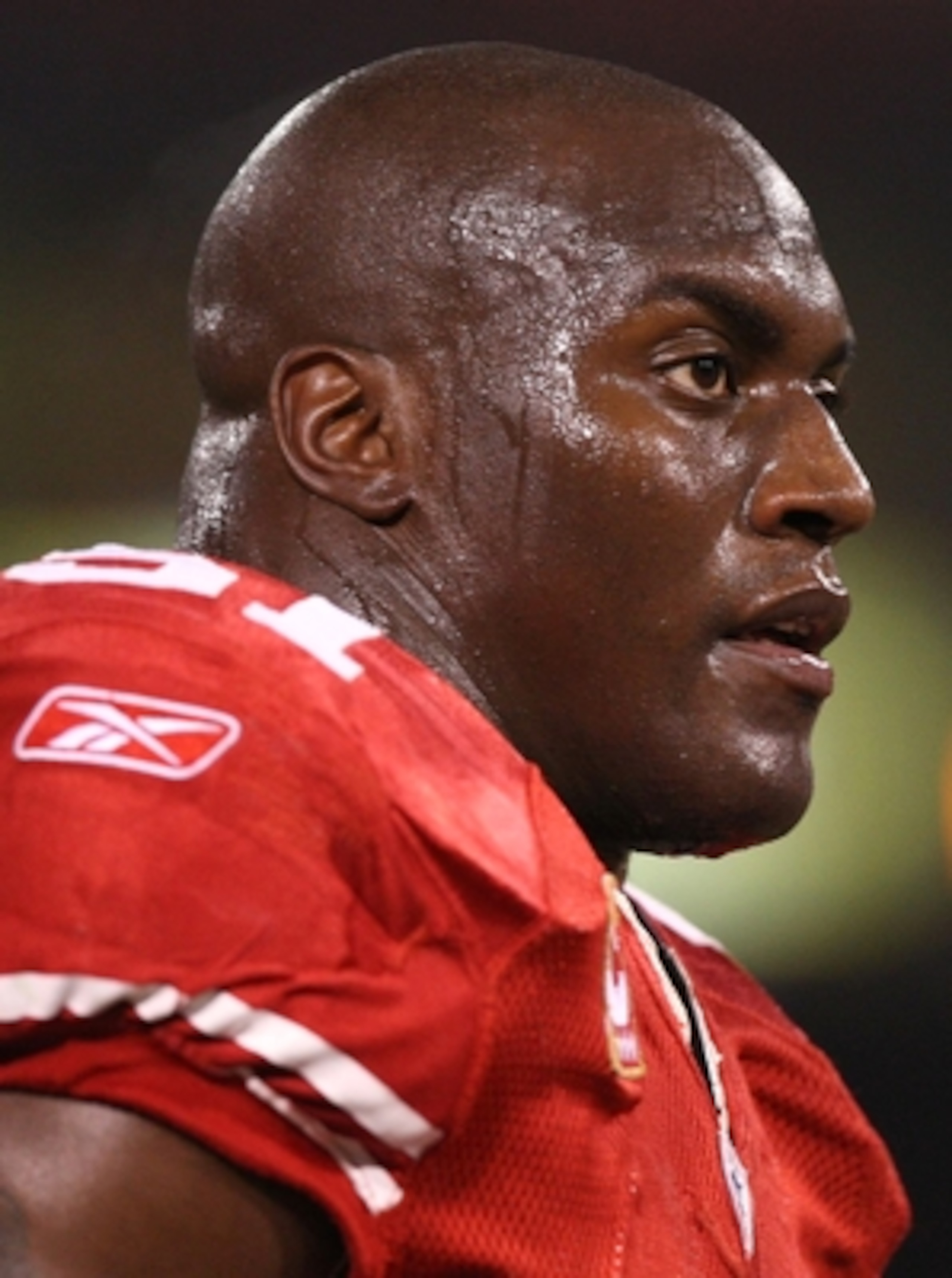 SAN FRANCISCO - DECEMBER 14:  Linebacker Takeo Spikes #51 of the San Francisco 49ers looks on before taking on the Arizona Cardinals at Candlestick Park on December 14, 2009 in San Francisco, California. (Photo by Jed Jacobsohn/Getty Images)