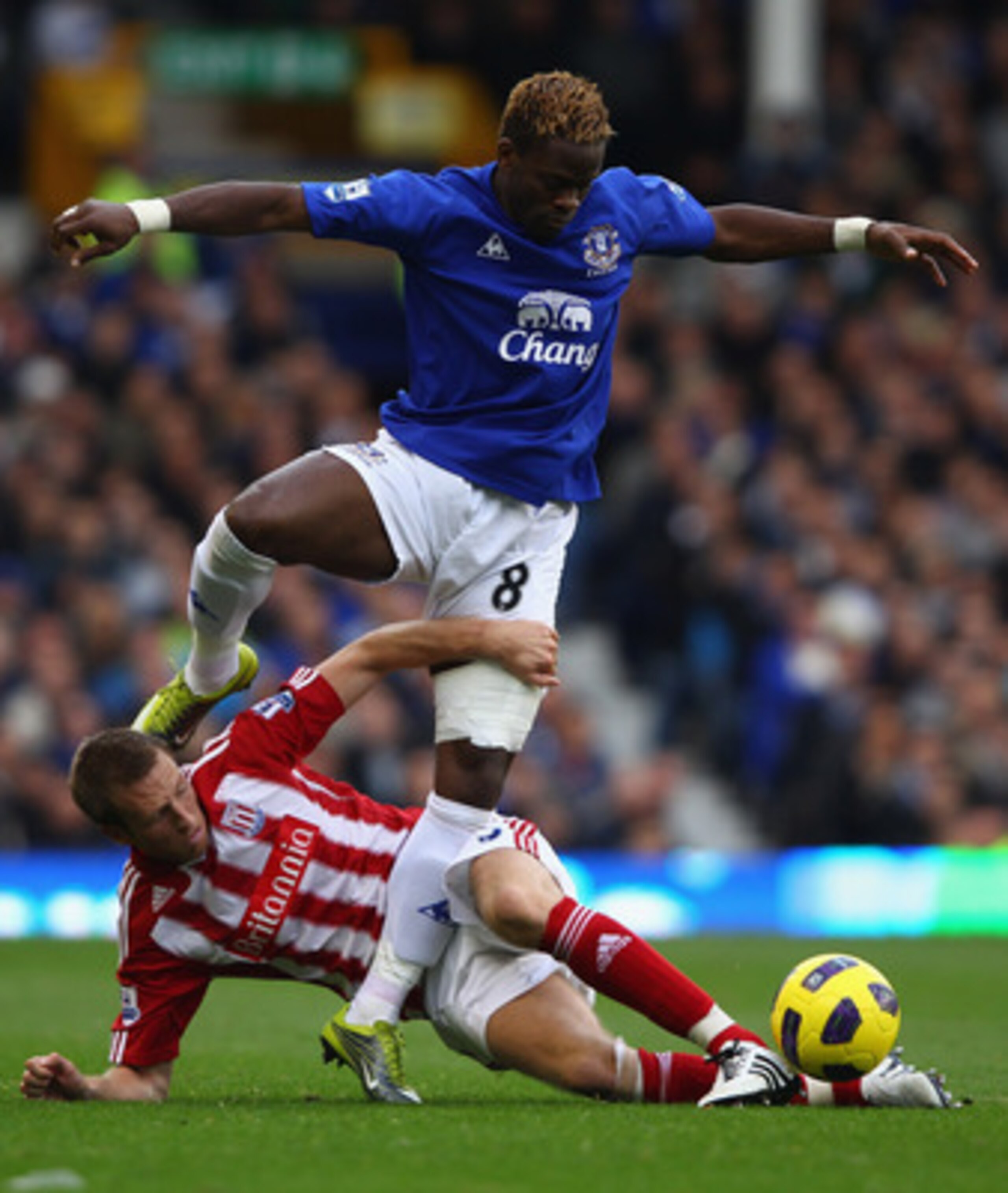 LIVERPOOL, ENGLAND - OCTOBER 30:  Louis Saha of Everton attempts to move past a challenge from Danny Collins of Stoke City during the Barclays Premier League match between Everton and Stoke City at Goodison Park on October 30, 2010 in Liverpool, England.