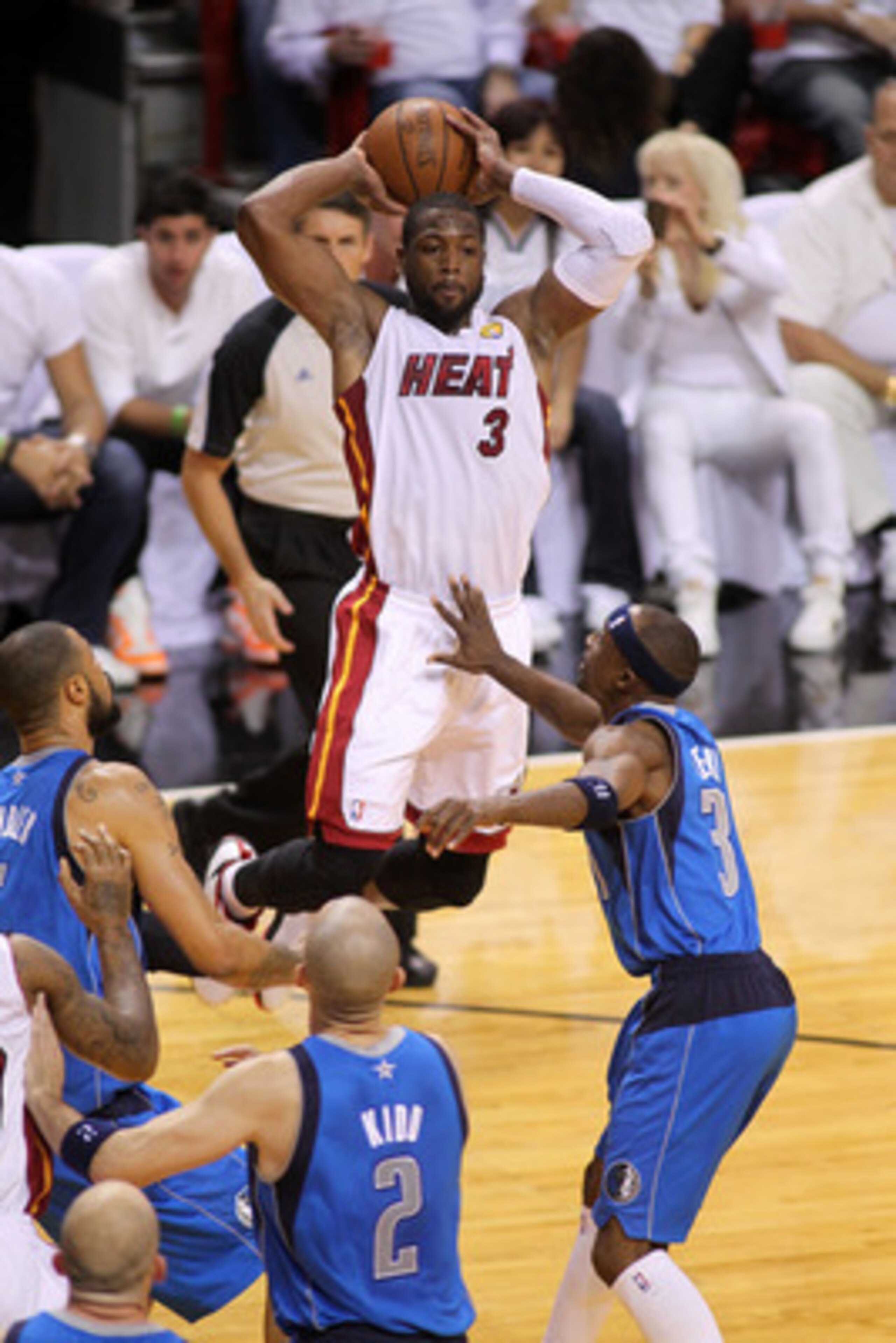 MIAMI, FL - JUNE 12: Dwyane Wade #3 of the Miami Heat looks to pass the ball against the Dallas Mavericks in Game Six of the 2011 NBA Finals at American Airlines Arena on June 12, 2011 in Miami, Florida. NOTE TO USER: User expressly acknowledges and agre MIAMI, FL - JUNE 12: Dwyane Wade #3 of the Miami Heat looks to pass the ball against the Dallas Mavericks in Game Six of the 2011 NBA Finals at American Airlines Arena on June 12, 2011 in Miami, Florida. NOTE TO USER: User expressly acknowledges and agre