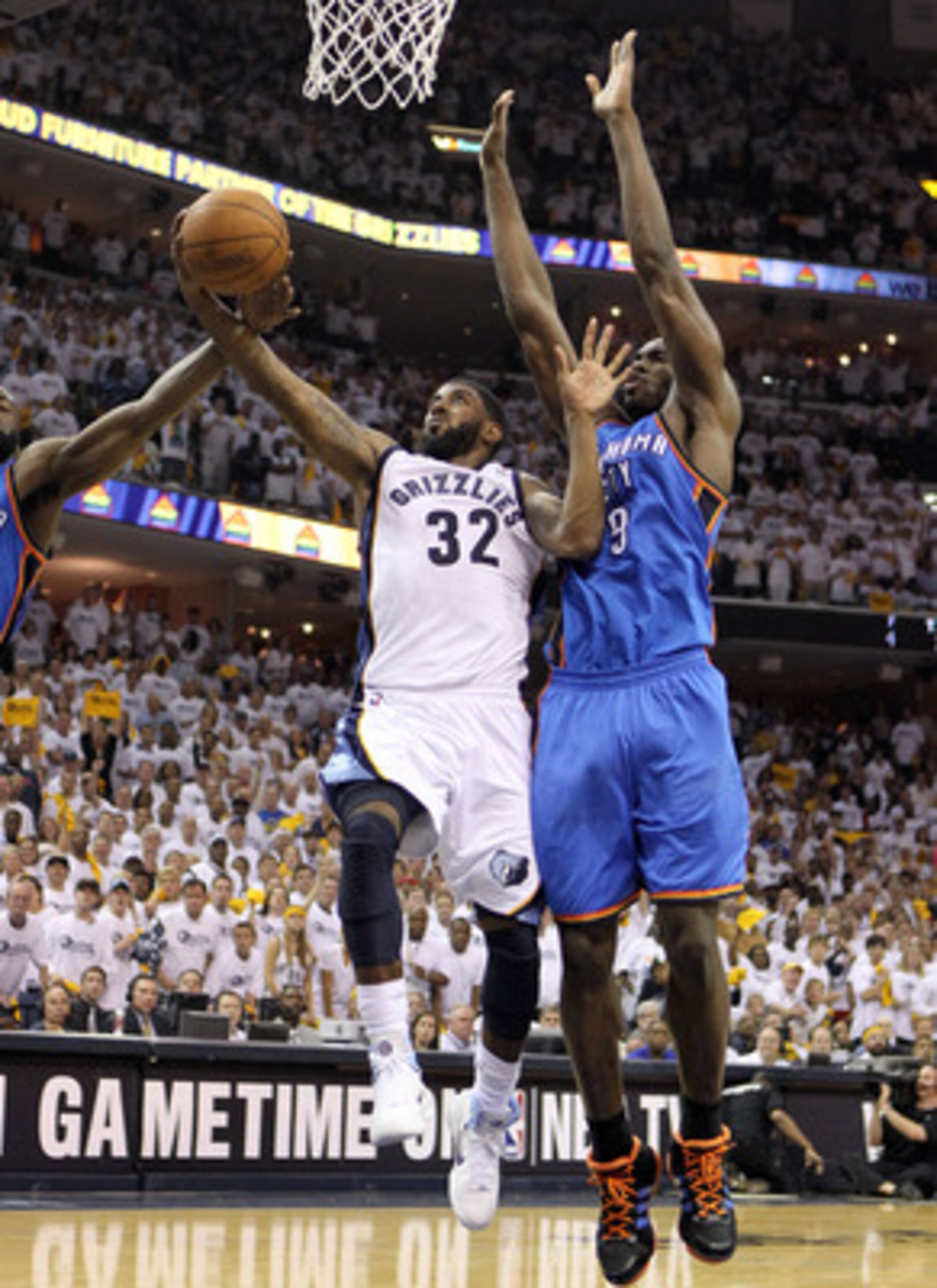 MEMPHIS, TN - MAY 07:  O.J. Mayo #32 of the  Memphis Grizzlies shoots the ball while defended by Serge Ibaka #9 of the Oklahoma City Thunder in Game Three of the Western Conference Semifinals in the 2011 NBA Playoffs at FedExForum on May 7, 2011 in Memphi