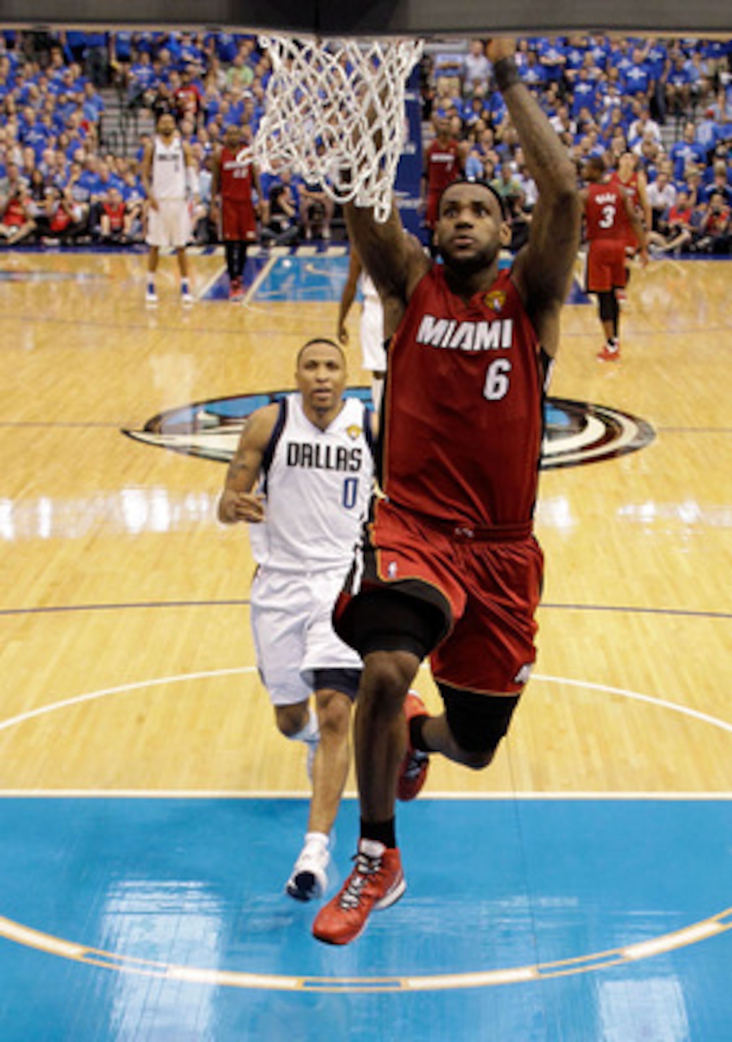DALLAS, TX - JUNE 07: LeBron James #6 of the Miami Heat dunks against the Dallas Mavericks in Game Four of the 2011 NBA Finals at American Airlines Center on June 7, 2011 in Dallas, Texas. The Mavericks won 86-83. NOTE TO USER: User expressly acknowledg DALLAS, TX - JUNE 07: LeBron James #6 of the Miami Heat dunks against the Dallas Mavericks in Game Four of the 2011 NBA Finals at American Airlines Center on June 7, 2011 in Dallas, Texas. The Mavericks won 86-83. NOTE TO USER: User expressly acknowledg
