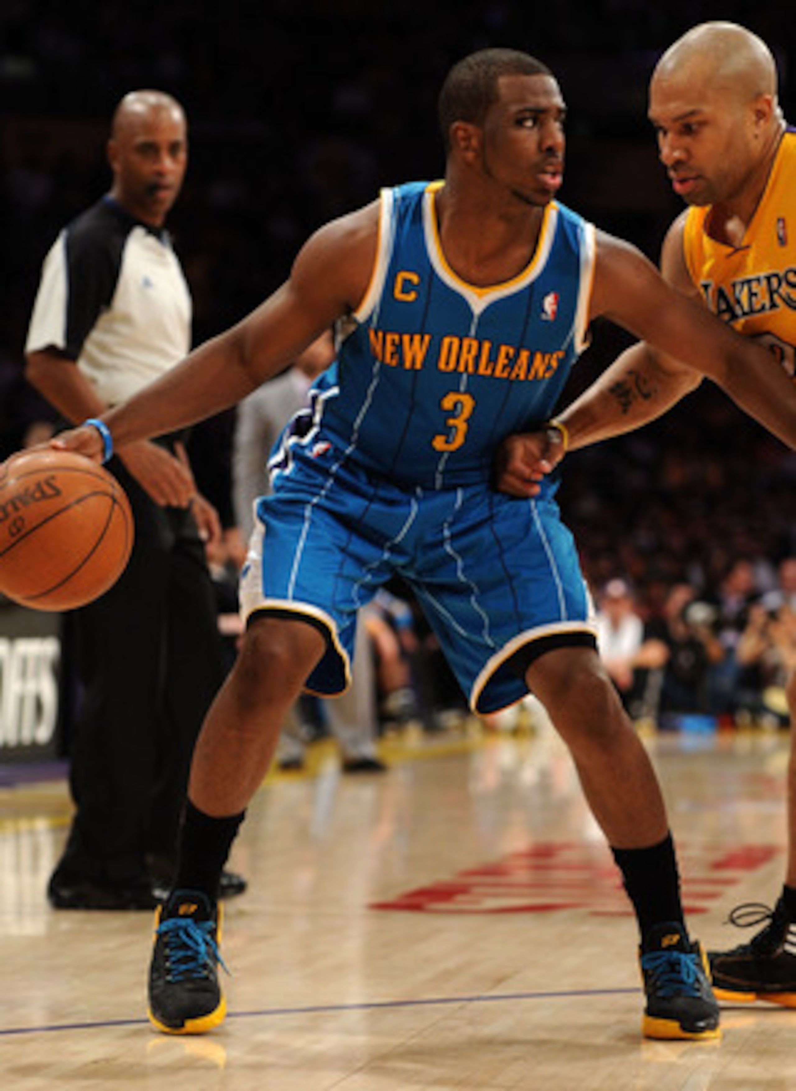 LOS ANGELES, CA - APRIL 26: Chris Paul #3 of the New Orleans Hornets moves the ball against Derek Fisher #2 of the Los Angeles Lakers in Game Five of the Western Conference Quarterfinals in the 2011 NBA Playoffs on April 26, 2011 at Staples Center in Los LOS ANGELES, CA - APRIL 26: Chris Paul #3 of the New Orleans Hornets moves the ball against Derek Fisher #2 of the Los Angeles Lakers in Game Five of the Western Conference Quarterfinals in the 2011 NBA Playoffs on April 26, 2011 at Staples Center in Los