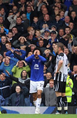 LIVERPOOL, ENGLAND - SEPTEMBER 18:  Marouane Fellaini of Everton holds his head after missing a goalscoring chance during the Barclays Premier League match between Everton and Newcastle United at Goodison Park on September 18, 2010 in Liverpool, England.
