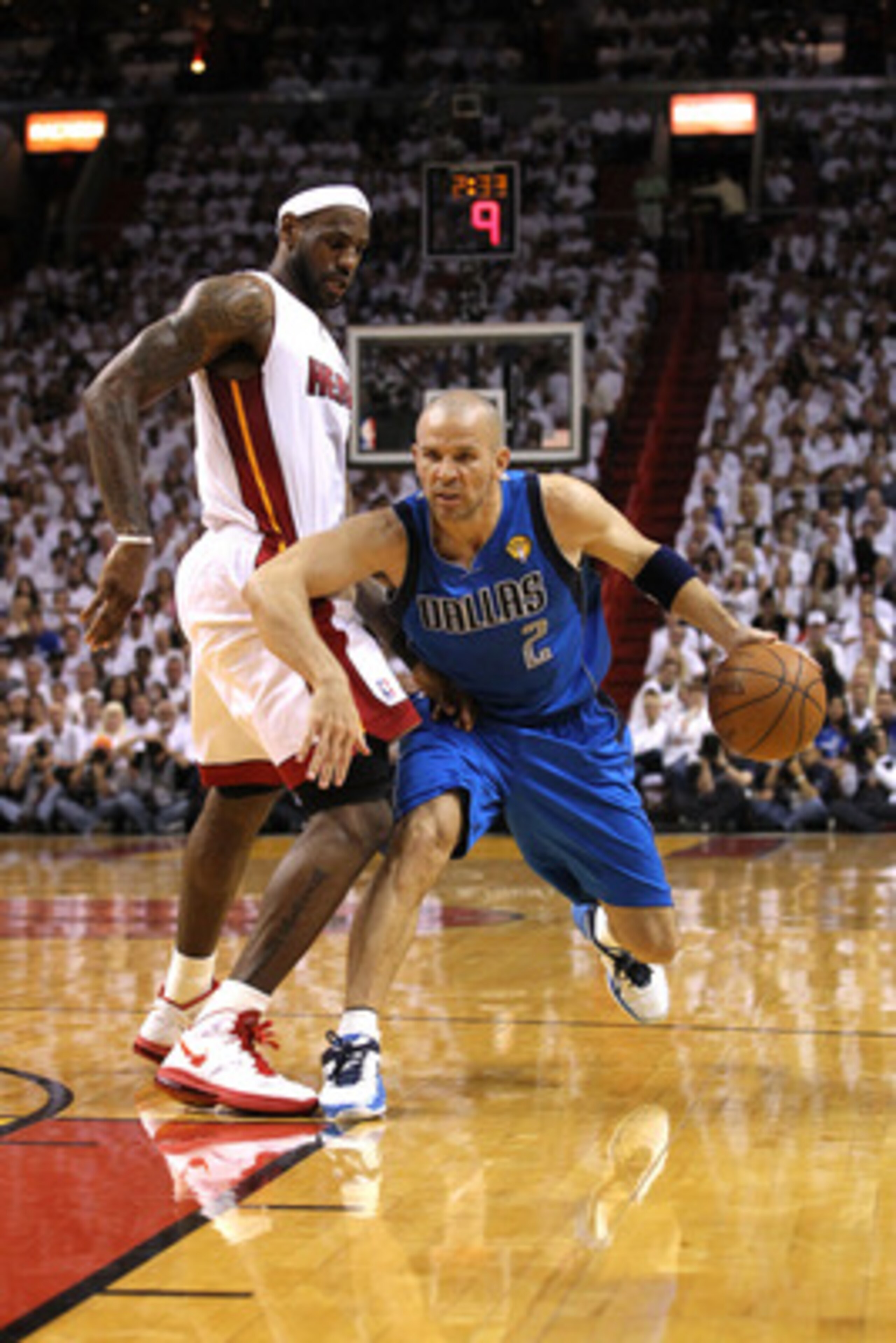 MIAMI, FL - JUNE 12:  Jason Kidd #2 of the Dallas Mavericks drives against LeBron James #6 of the Miami Heat in Game Six of the 2011 NBA Finals at American Airlines Arena on June 12, 2011 in Miami, Florida. The Mavericks won 105-95. NOTE TO USER: User exp