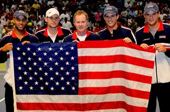 BIRMINGHAM, AL - MARCH 08:  Members of the USA Davis Cup team, James Blake, Andy Roddick, Captain Patrick McEnroe, Mike Bryan, Bob Bryan, pose for photographers after clinching their victory over Switzerland during their tie at Birmingham-Jefferson Conven
