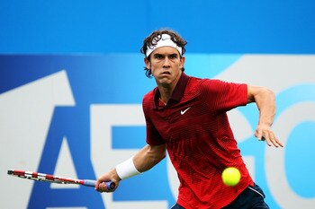 LONDON, ENGLAND - JUNE 06:  Ryan Sweeting of the United States eyes the ball during his Men's Singles first round match against Ivan Ljubicic of Croatia on day one of the AEGON Championships at Queens Club on June 6, 2011 in London, England.  (Photo by Ju