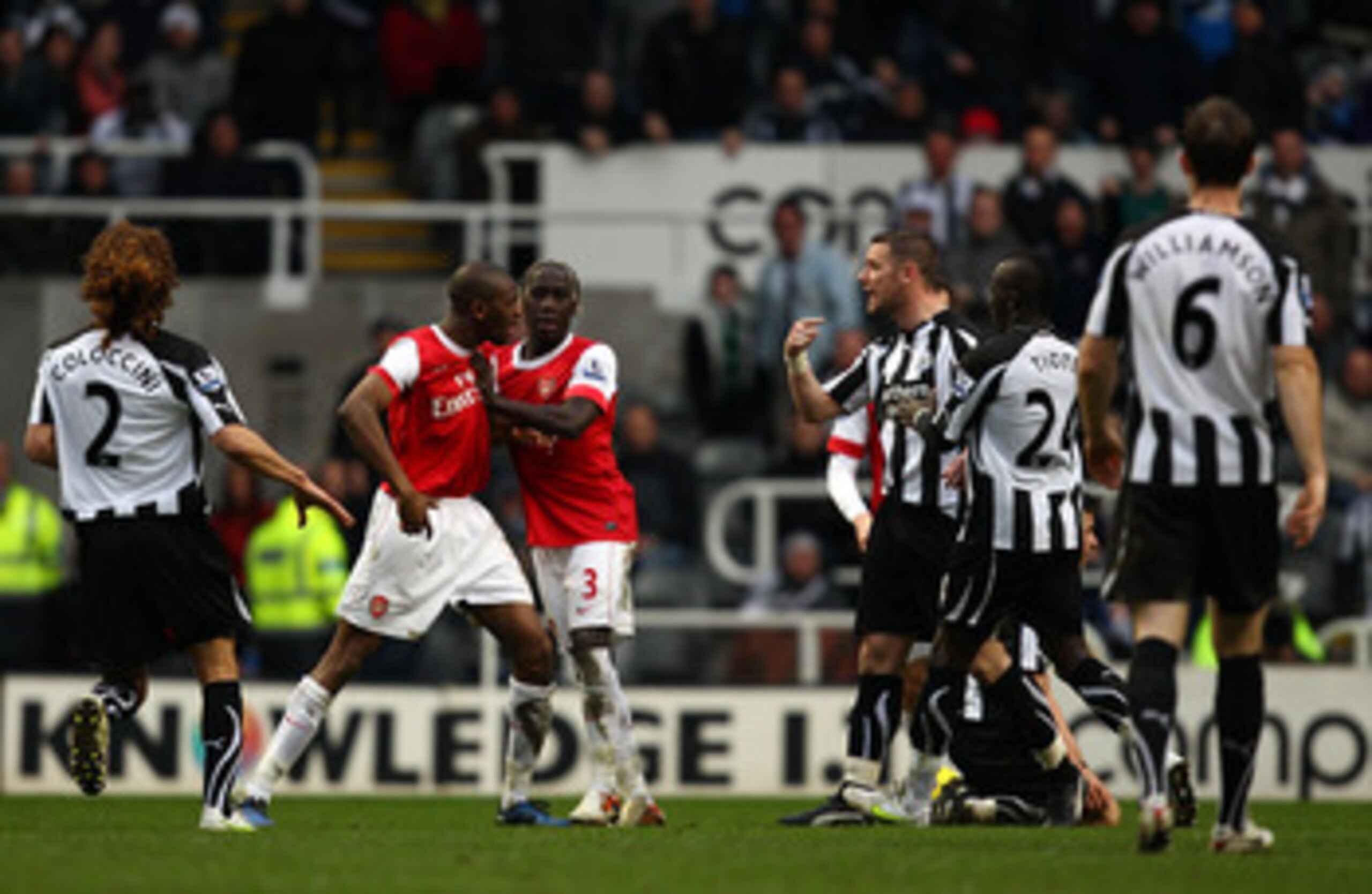 NEWCASTLE UPON TYNE, ENGLAND - FEBRUARY 05:  Abou Diaby of Arsenal argues with Kevin Nolan of Newcastle and gets sent off during the Barclays Premier League match between Newcastle United and Arsenal at St James' Park on February 5, 2011 in Newcastle upon