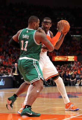 NEW YORK, NY - APRIL 24:  Amar'e Stoudemire #1 of the New York Knicks looks to pass against Glen Davis #11 of the Boston Celtics in Game Four of the Eastern Conference Quarterfinals during the 2011 NBA Playoffs on April 24, 2011 at Madison Square Garden i