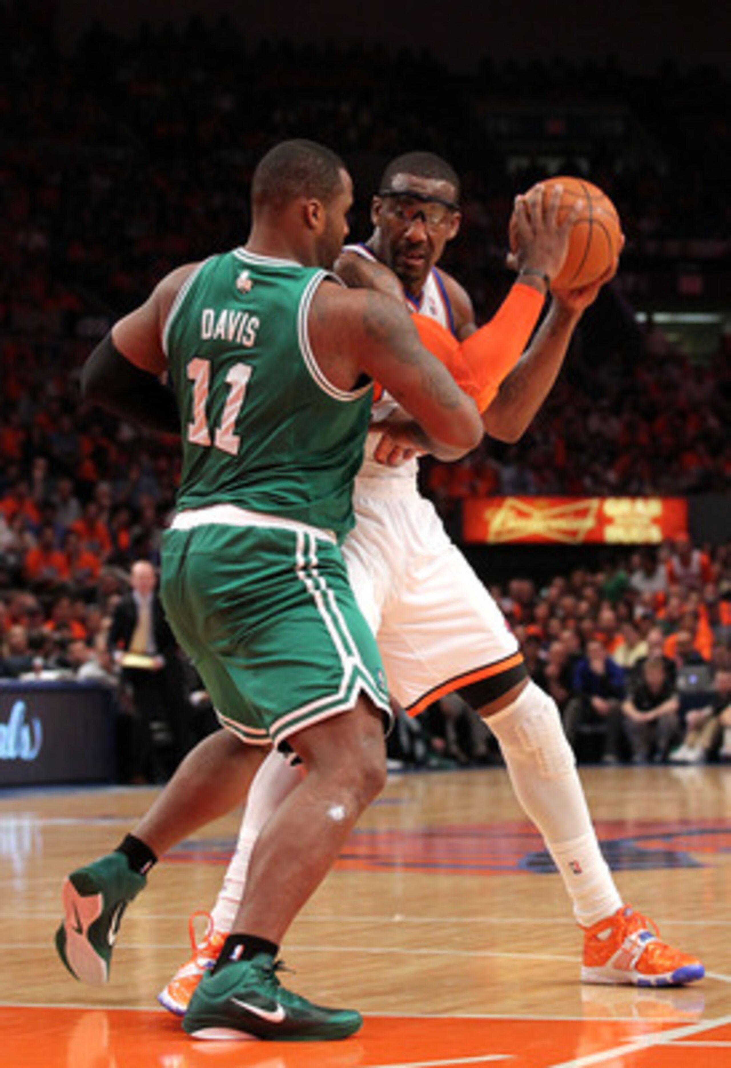 NEW YORK, NY - APRIL 24: Amar'e Stoudemire #1 of the New York Knicks looks to pass against Glen Davis #11 of the Boston Celtics in Game Four of the Eastern Conference Quarterfinals during the 2011 NBA Playoffs on April 24, 2011 at Madison Square Garden i NEW YORK, NY - APRIL 24: Amar'e Stoudemire #1 of the New York Knicks looks to pass against Glen Davis #11 of the Boston Celtics in Game Four of the Eastern Conference Quarterfinals during the 2011 NBA Playoffs on April 24, 2011 at Madison Square Garden i