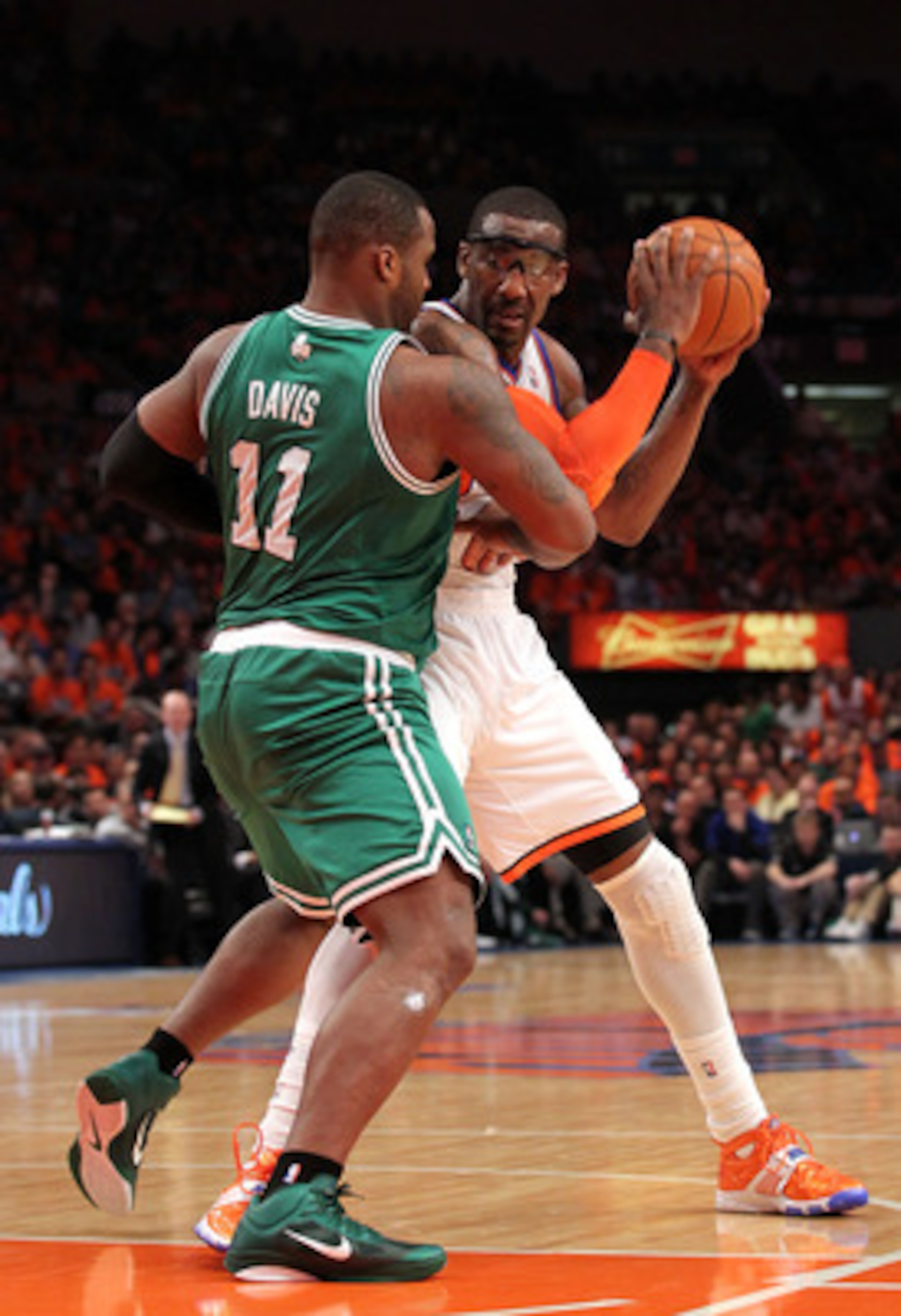 NEW YORK, NY - APRIL 24: Amar'e Stoudemire #1 of the New York Knicks looks to pass against Glen Davis #11 of the Boston Celtics in Game Four of the Eastern Conference Quarterfinals during the 2011 NBA Playoffs on April 24, 2011 at Madison Square Garden i NEW YORK, NY - APRIL 24: Amar'e Stoudemire #1 of the New York Knicks looks to pass against Glen Davis #11 of the Boston Celtics in Game Four of the Eastern Conference Quarterfinals during the 2011 NBA Playoffs on April 24, 2011 at Madison Square Garden i