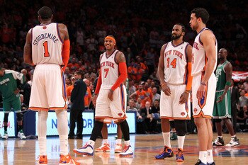 NEW YORK, NY - APRIL 24:  (L-R) Amar'e Stoudemire #1, Carmelo Anthony #7, Ronny Turiaf #14 and Landry Fields #6 of the New York Knicks look on against the Boston Celtics in Game Four of the Eastern Conference Quarterfinals during the 2011 NBA Playoffs on