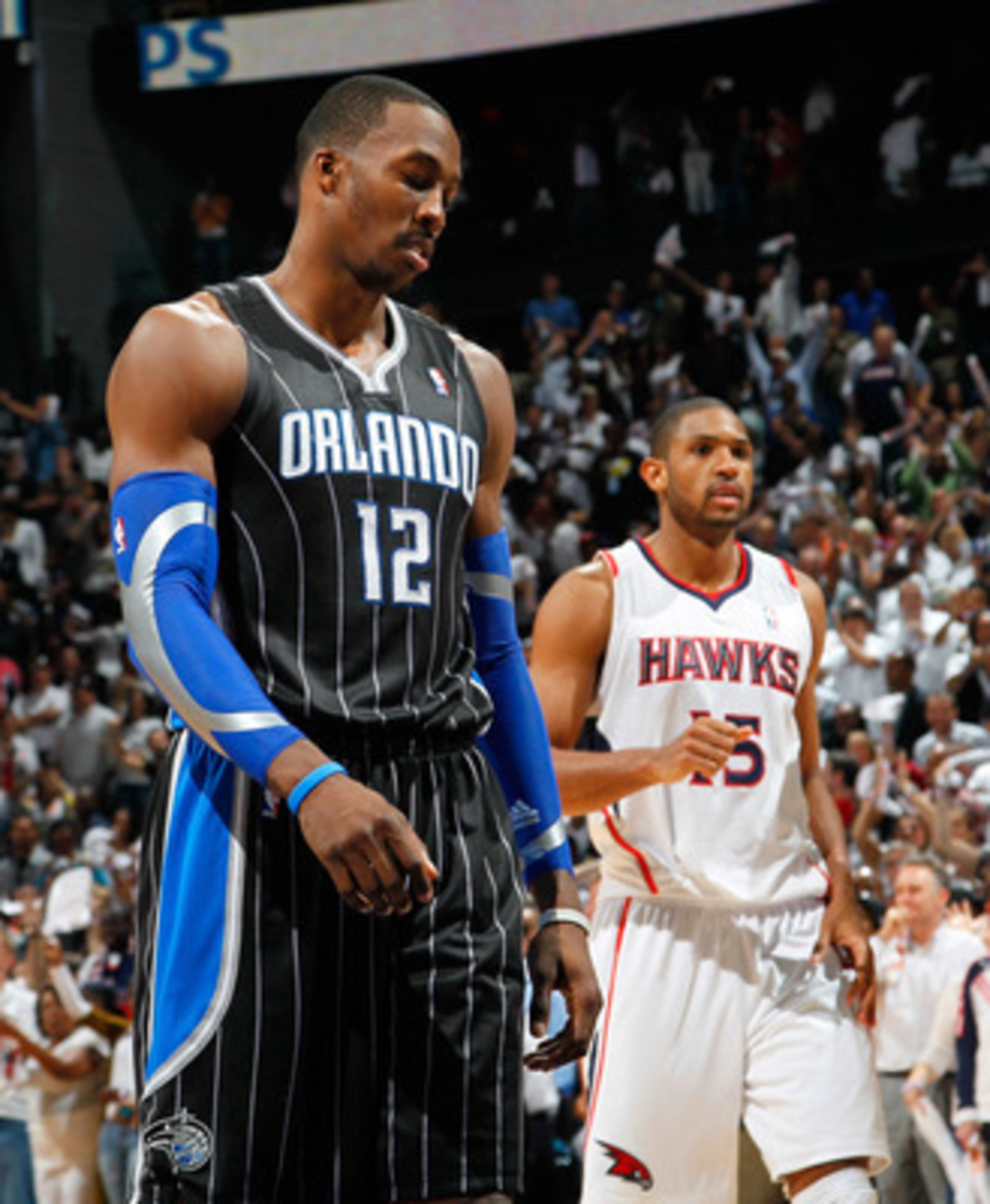 ATLANTA, GA - APRIL 28: Dwight Howard #12 of the Orlando Magic reacts after a turnover to the Atlanta Hawks during Game Six of the Eastern Conference Quarterfinals in the 2011 NBA Playoffs at Philips Arena on April 28, 2011 in Atlanta, Georgia. NOTE TO ATLANTA, GA - APRIL 28: Dwight Howard #12 of the Orlando Magic reacts after a turnover to the Atlanta Hawks during Game Six of the Eastern Conference Quarterfinals in the 2011 NBA Playoffs at Philips Arena on April 28, 2011 in Atlanta, Georgia. NOTE TO