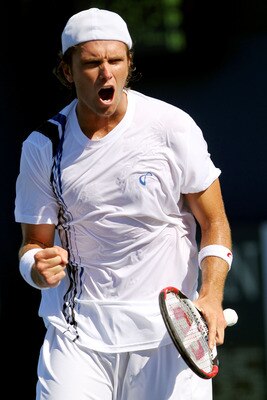 NEW YORK - AUGUST 30:  Robert Kendrick of the United States celebrates a point against Gael Monfils of France during the Men's Singles first round match on day one of the 2010 U.S. Open at the USTA Billie Jean King National Tennis Center on August 30, 201