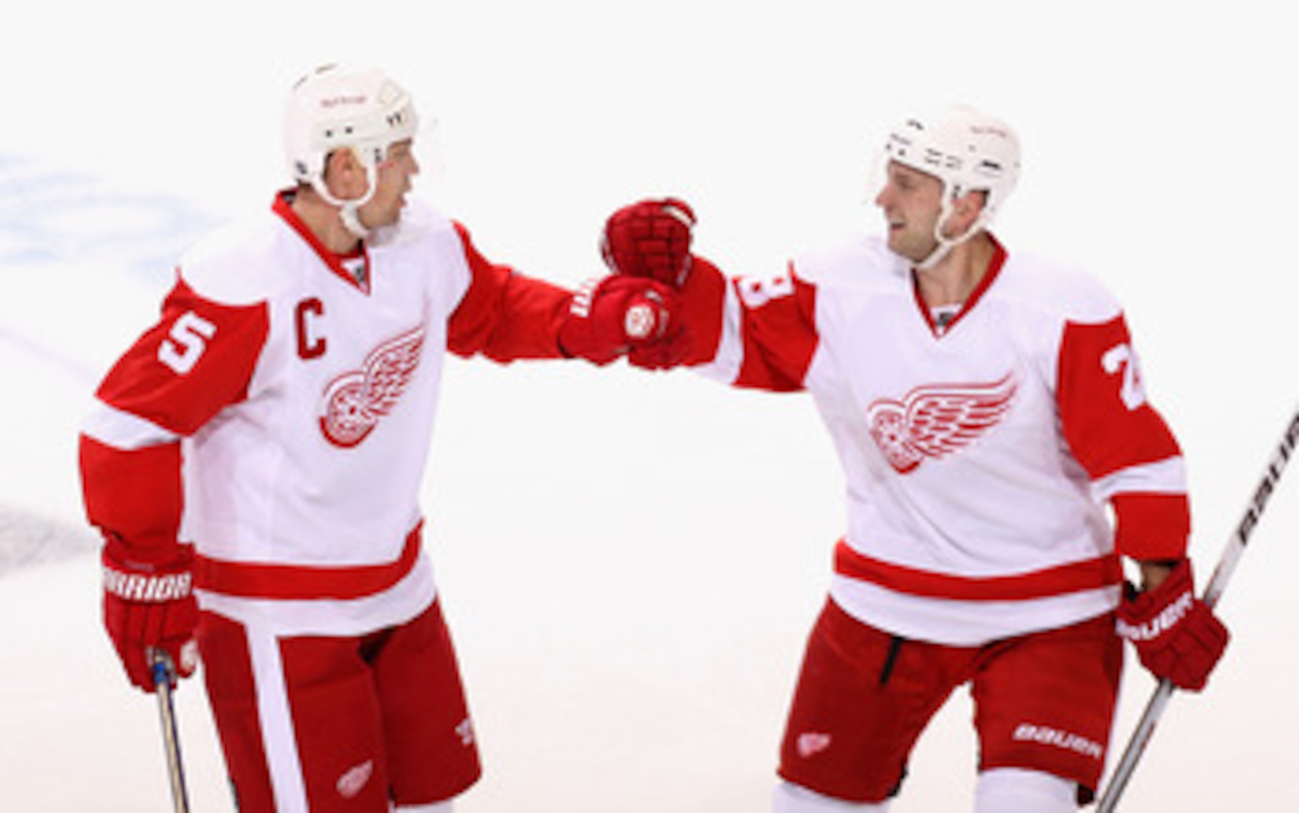 GLENDALE, AZ - APRIL 14: Nicklas Lidstrom #5 and Brian Rafalski #28 of the Detroit Red Wings celebrate after Nicklas Lidstrom scored a first period power play goal against the Phoenix Coyotes in Game One of the Western Conference Quarterfinals during the GLENDALE, AZ - APRIL 14: Nicklas Lidstrom #5 and Brian Rafalski #28 of the Detroit Red Wings celebrate after Nicklas Lidstrom scored a first period power play goal against the Phoenix Coyotes in Game One of the Western Conference Quarterfinals during the