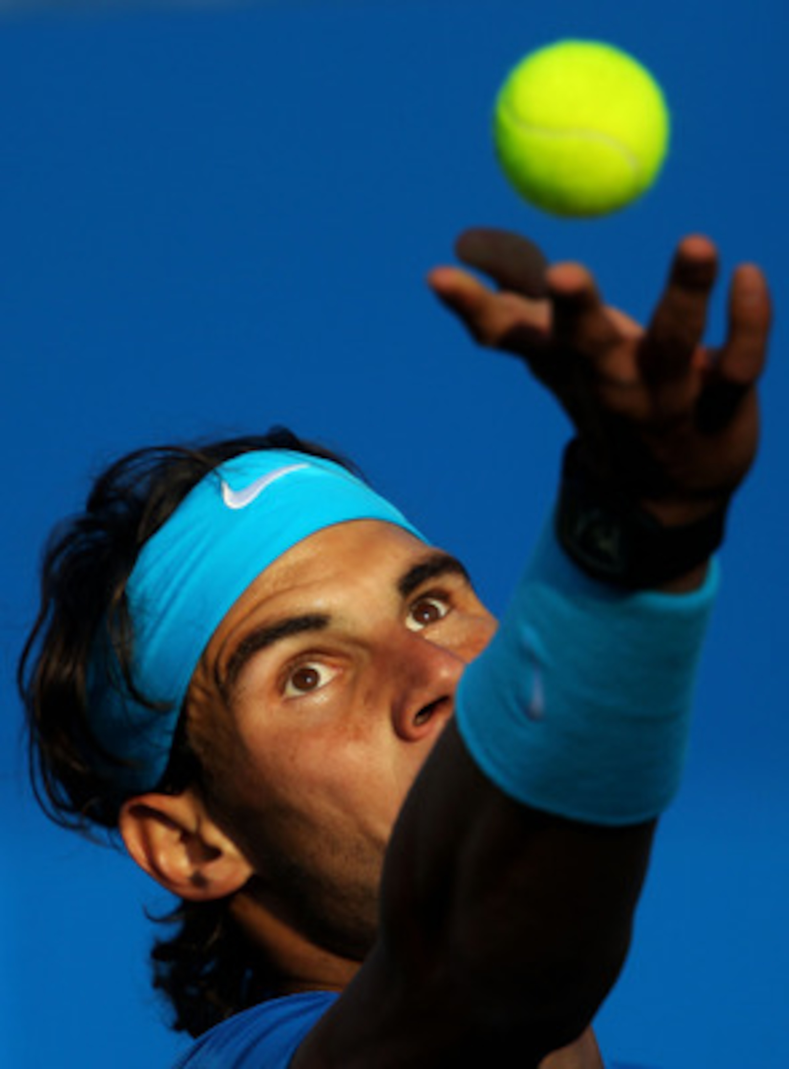 LONDON, ENGLAND - JUNE 10:  Rafael Nadal of Spain serves during his Men's Singles quarter final match against Jo-Wilfred Tsonga of France on day five of the AEGON Championships at Queens Club on June 10, 2011 in London, England.  (Photo by Julian Finney/G