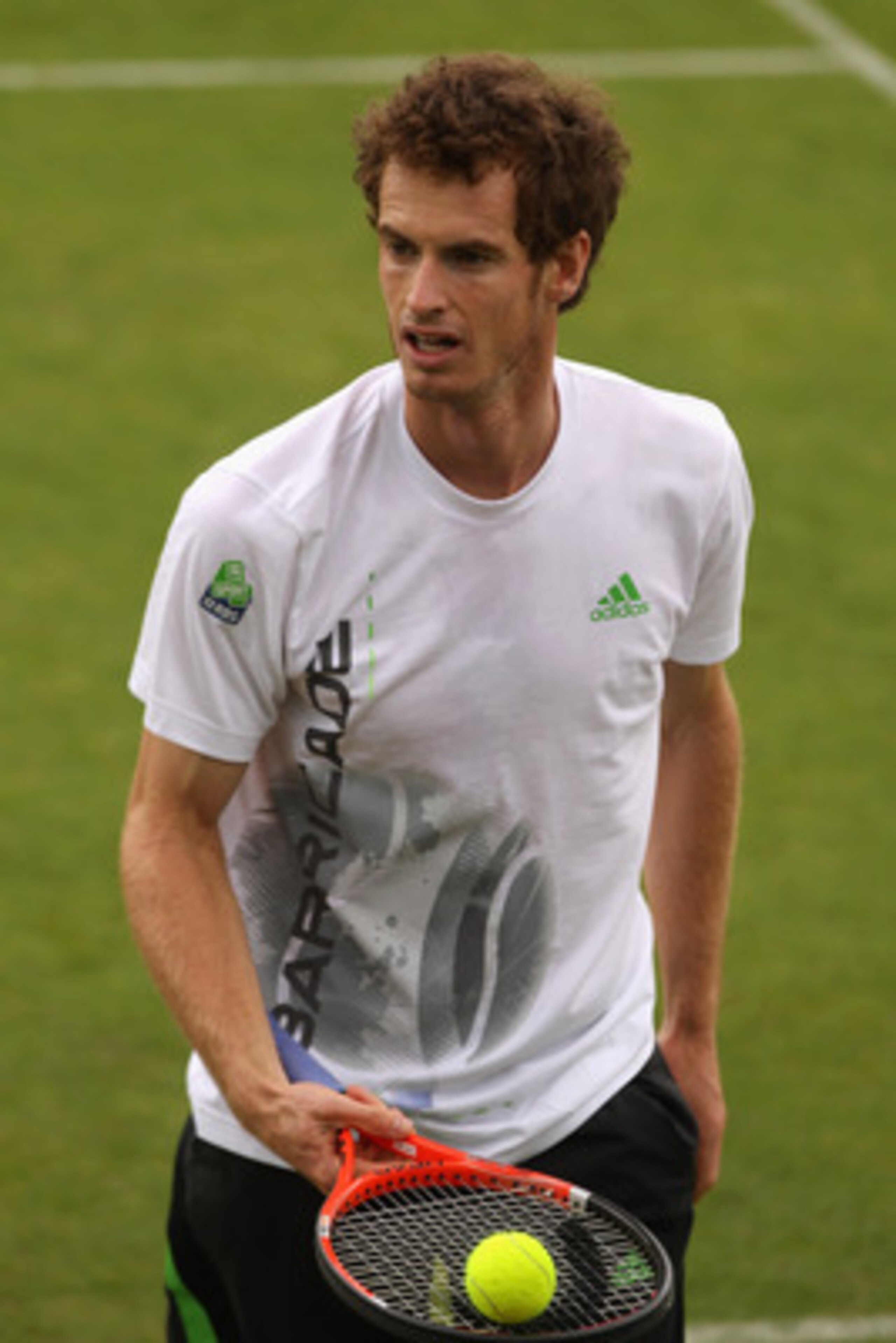 WIMBLEDON, ENGLAND - JUNE 18:   Andy Murray of Great Britain trains on the Aorangi Practice court at the All England Lawn Tennis and Croquet Club ahead of the Wimbledon Lawn Tennis Championships on June 18, 2011 in London, England. The Championships, whic