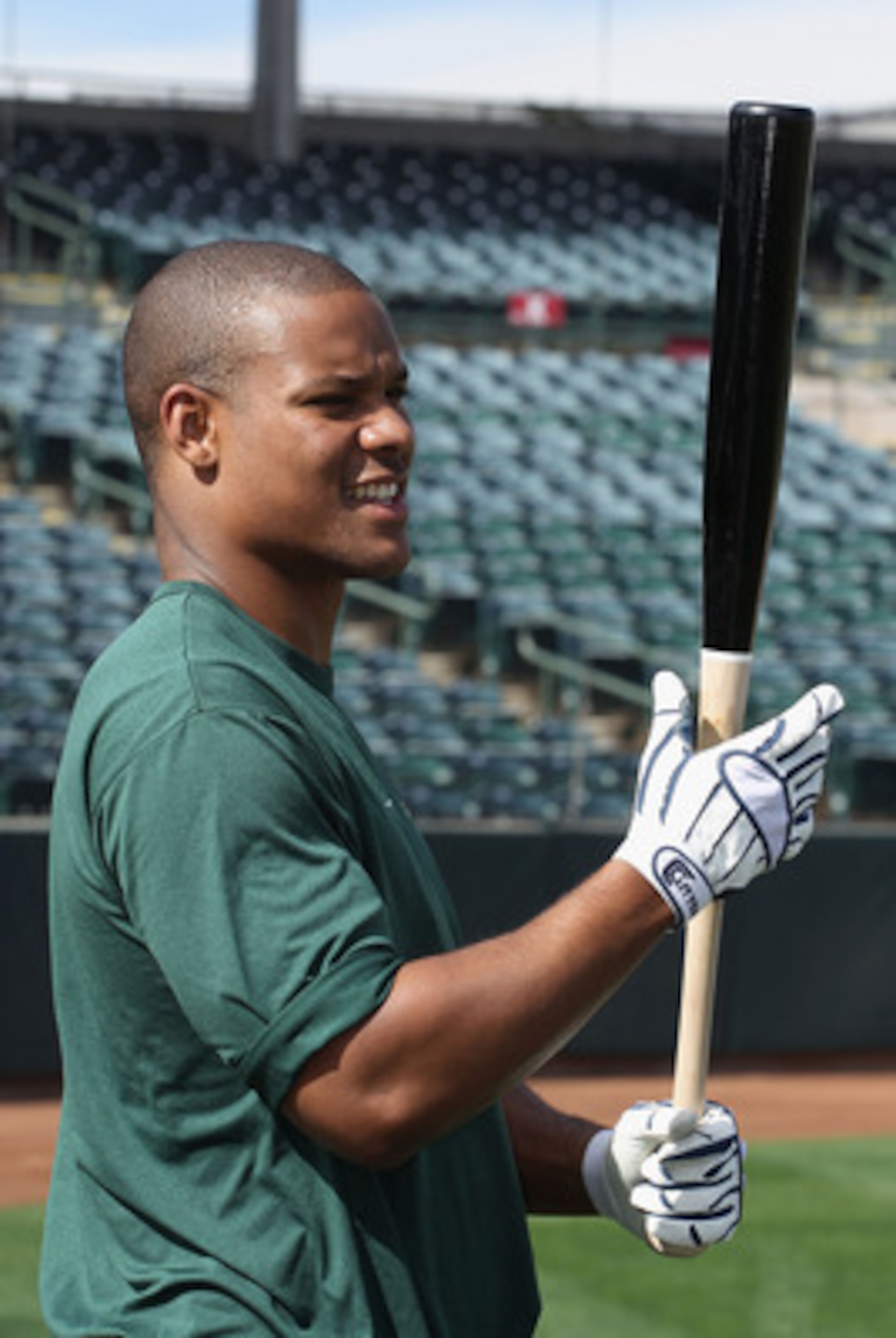PHOENIX, AZ - FEBRUARY 16: Michael Taylor #23 of the Oakland Athletics takes batting practice during a MLB spring training practice at Phoenix Municipal Stadium on February 16, 2011 in Phoenix, Arizona. (Photo by Christian Petersen/Getty Images) PHOENIX, AZ - FEBRUARY 16: Michael Taylor #23 of the Oakland Athletics takes batting practice during a MLB spring training practice at Phoenix Municipal Stadium on February 16, 2011 in Phoenix, Arizona. (Photo by Christian Petersen/Getty Images)