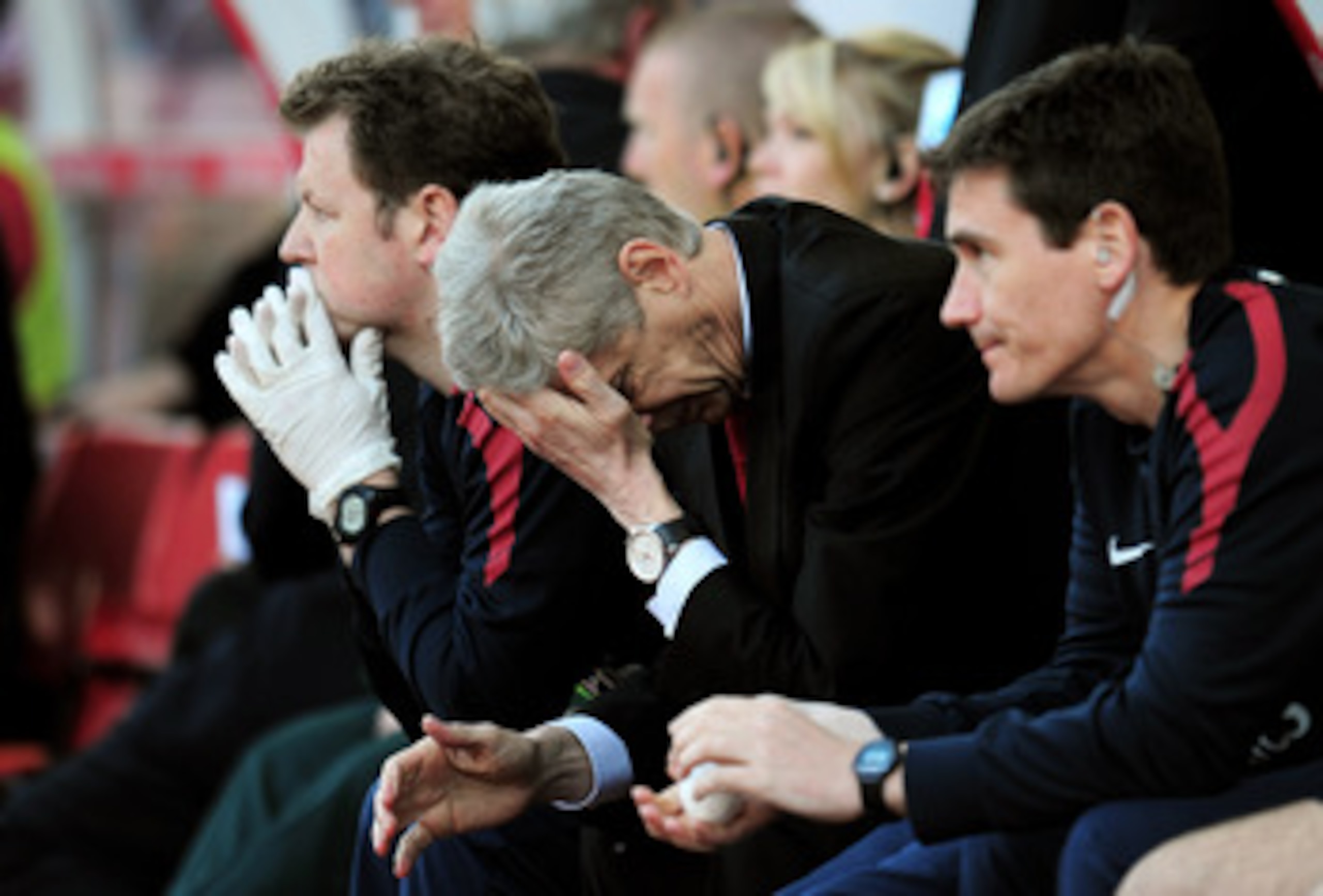 STOKE ON TRENT, ENGLAND - MAY 08:  A dejected Arsene Wenger the Arsenal manager holds his head in his hands as his team head towards a 3-1 defeat during the Barclays Premier League match between Stoke City and Arsenal at the Britannia Stadium on May 8, 20