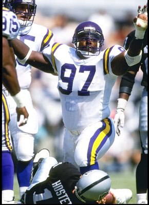 5 Sep 1993:  Defensive lineman Henry Thomas of the Minnesota Vikings celebrates during a game against the Los Angeles Raiders at the Los Angeles Memorial Coliseum in Los Angeles, California.  The Raiders won the game, 24-7. Mandatory Credit: Stephen Dunn