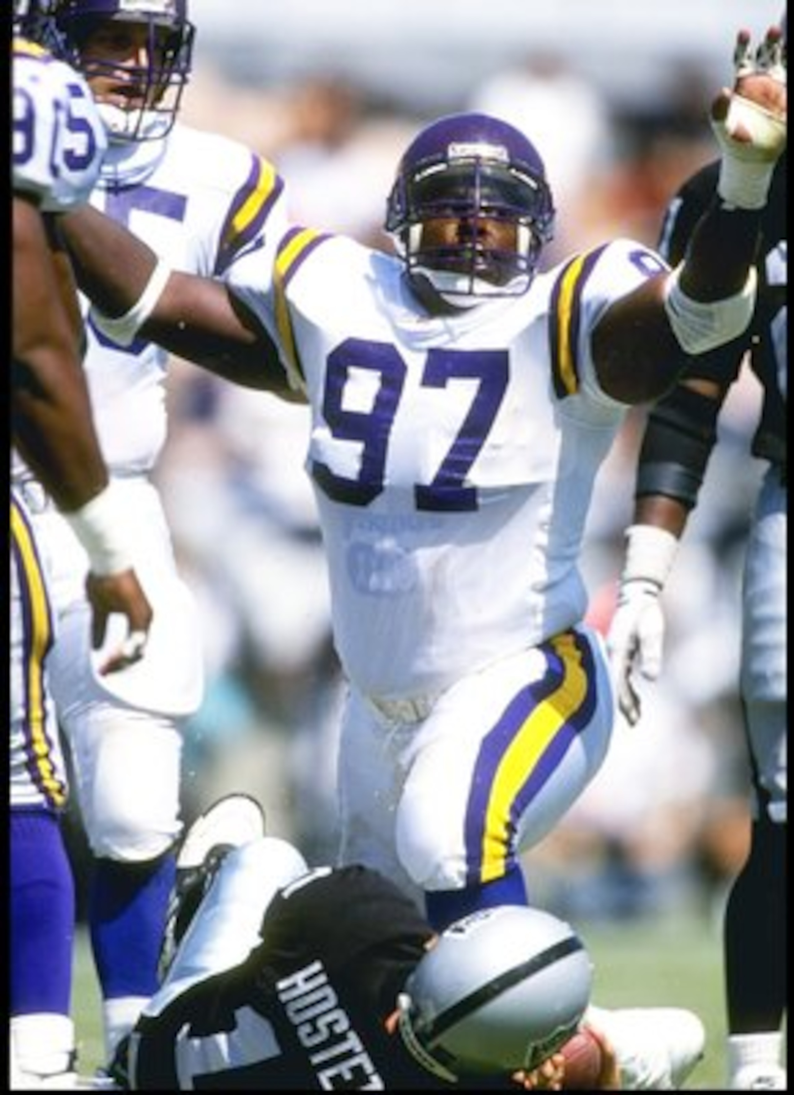 5 Sep 1993:  Defensive lineman Henry Thomas of the Minnesota Vikings celebrates during a game against the Los Angeles Raiders at the Los Angeles Memorial Coliseum in Los Angeles, California.  The Raiders won the game, 24-7. Mandatory Credit: Stephen Dunn
