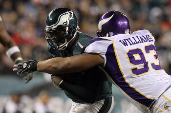PHILADELPHIA, PA - DECEMBER 28:  Michael Vick #7 of the Philadelphia Eagles in action against Kevin Williams #93 of the Minnesota Vikings at Lincoln Financial Field on December 26, 2010 in Philadelphia, Pennsylvania.  (Photo by Jim McIsaac/Getty Images)