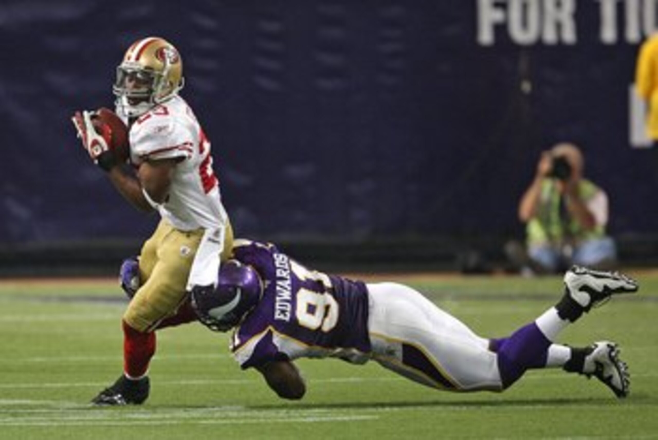 MINNEAPOLIS - SEPTEMBER 27: Marcus Hudson #23 of the San Francisco 49ers is tackled by Ray Edwards #91 of the Minnesota Vikings at the Hubert H. Humphrey Metrodome on September 27, 2009 in Minneapolis, Minnesota. The Vikings defeated the 49ers 27-24. (Pho