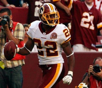 LANDOVER, MD - OCTOBER 07:    Washington Redskins cornerback Carlos Rogers #22 returns an interception for a touchdown in fourth quarter action against the Detroit Lions at FedEx Field October 7, 2007 in Landover, Maryland. The Redskins defeated the Lions